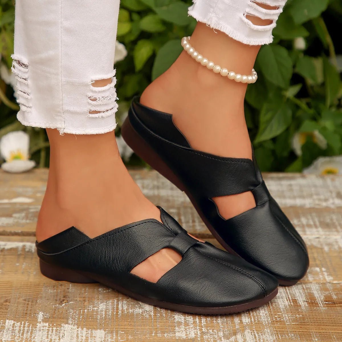 Women's faux leather cutout flat sandals by Plush Fashion Hub featuring stylish open-toe design and comfortable flat sole.