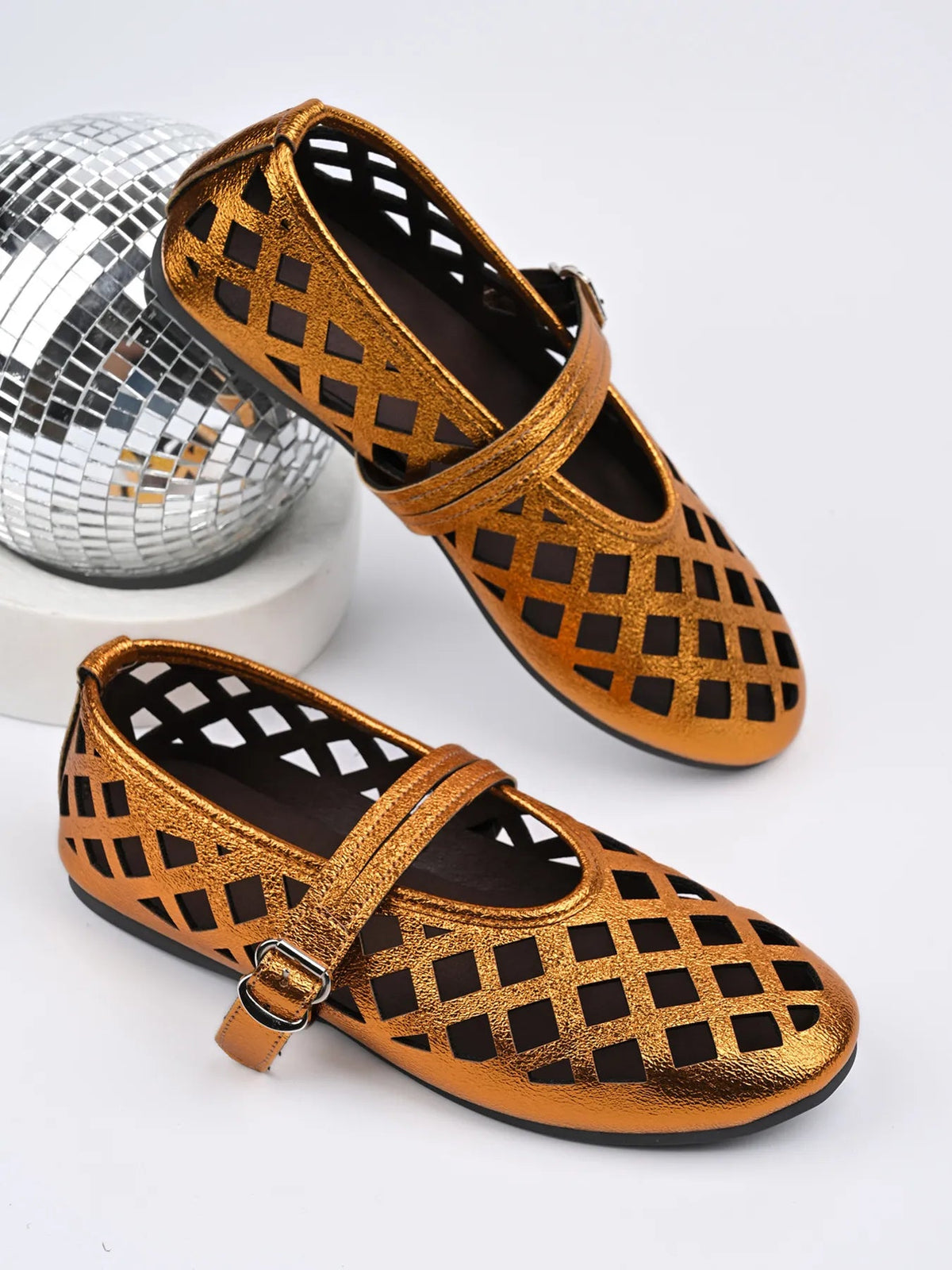 Women's vegan leather flat sandals with cutout design and round toe from Plush Fashion Hub.