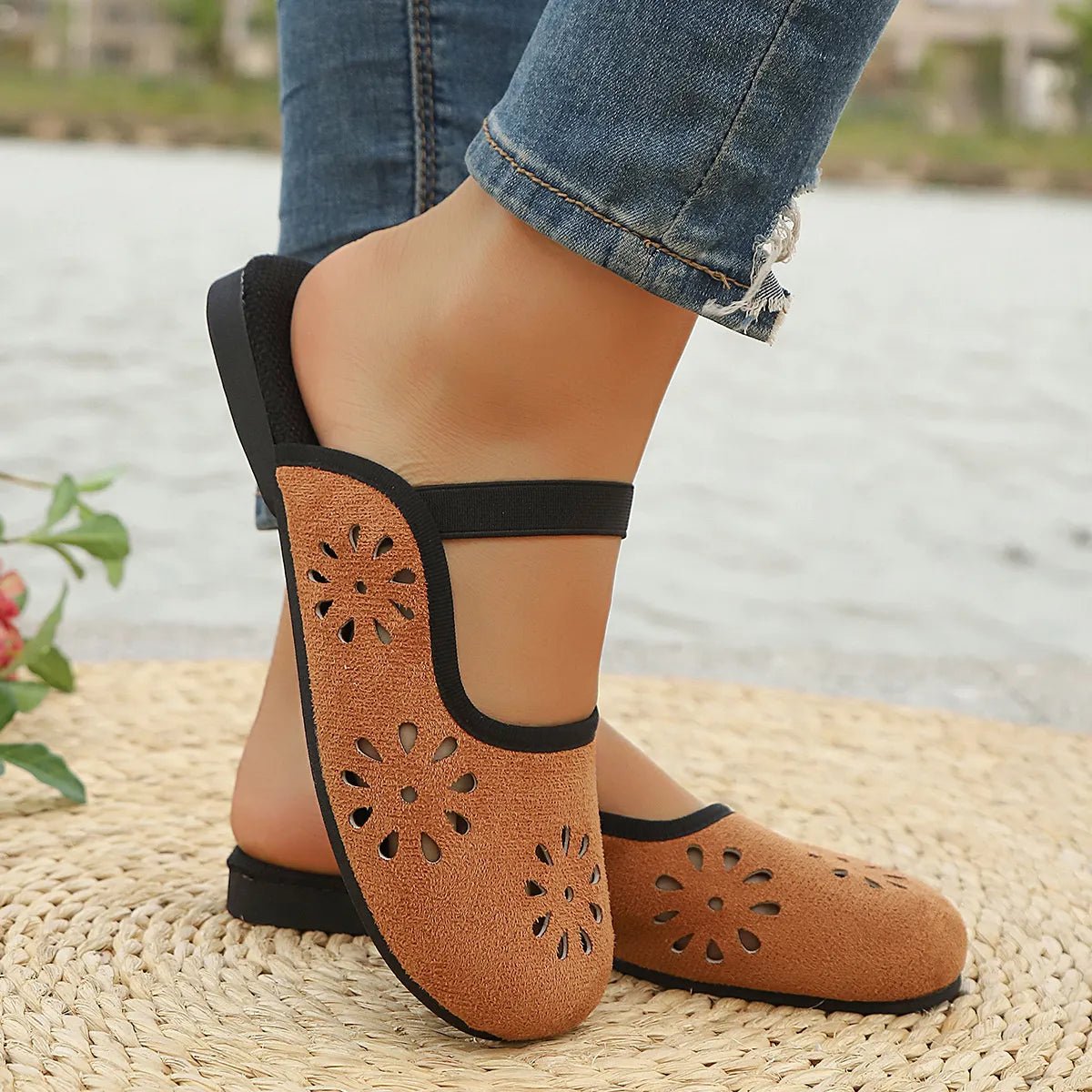 Women's slip-on flats with round toe and cutout design in premium PU leather by Plush Fashion Hub.