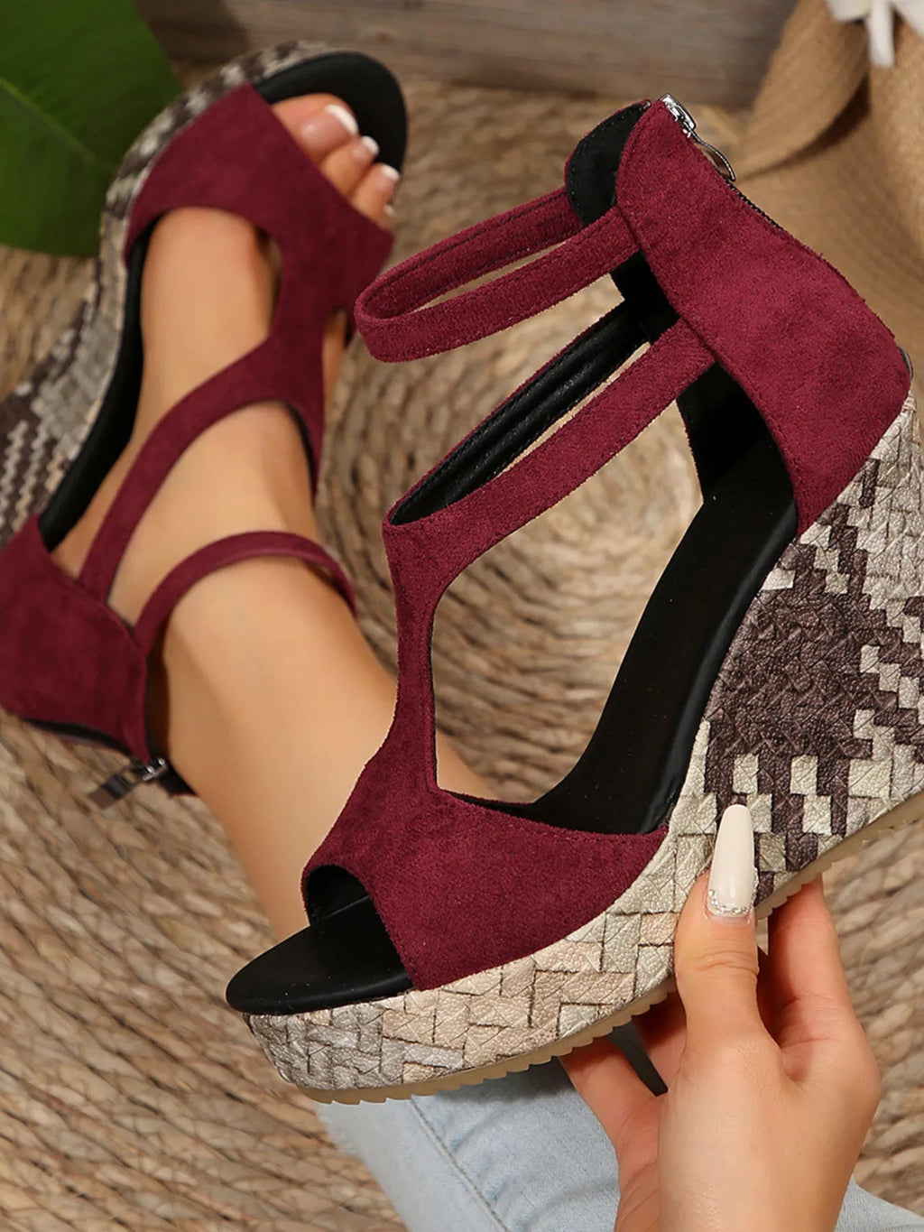 Women's faux leather wedge platform sandals with cutout design and high heels, featuring a chic and stylish wedge shoe by Trendsi.