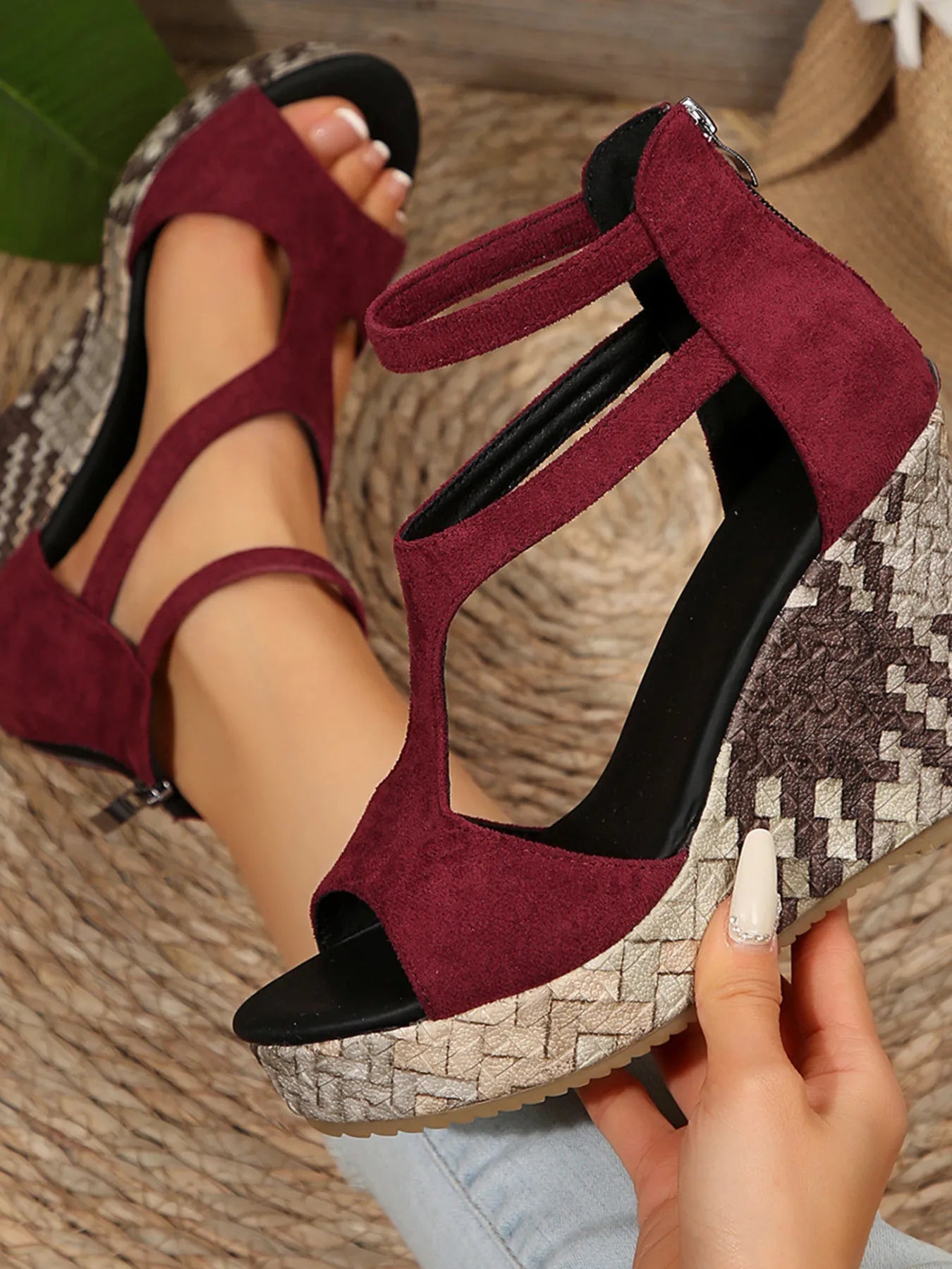 Women's faux leather wedge platform sandals with cutout design and high heels, featuring a chic and stylish wedge shoe by Trendsi.
