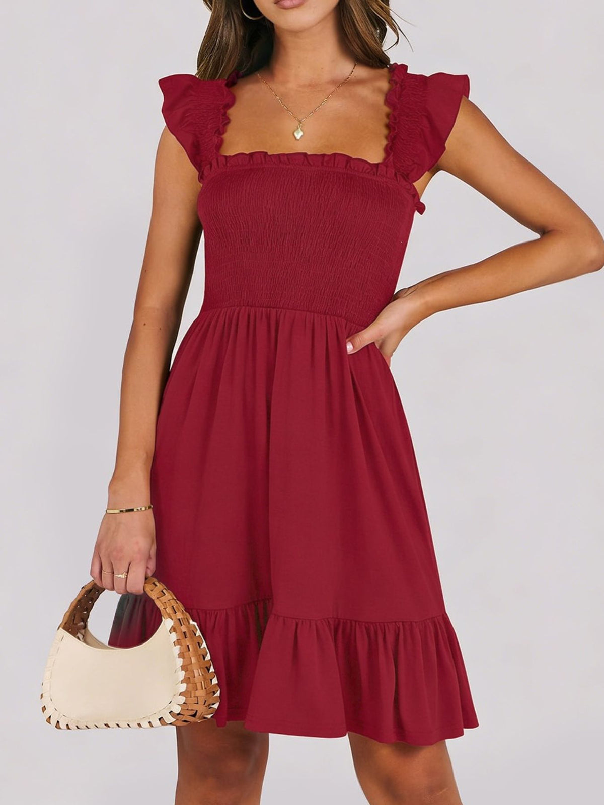 Lightweight women's summer dress with smocked bodice and ruffle hem, casual mini dress by Plush Fashion Hub.