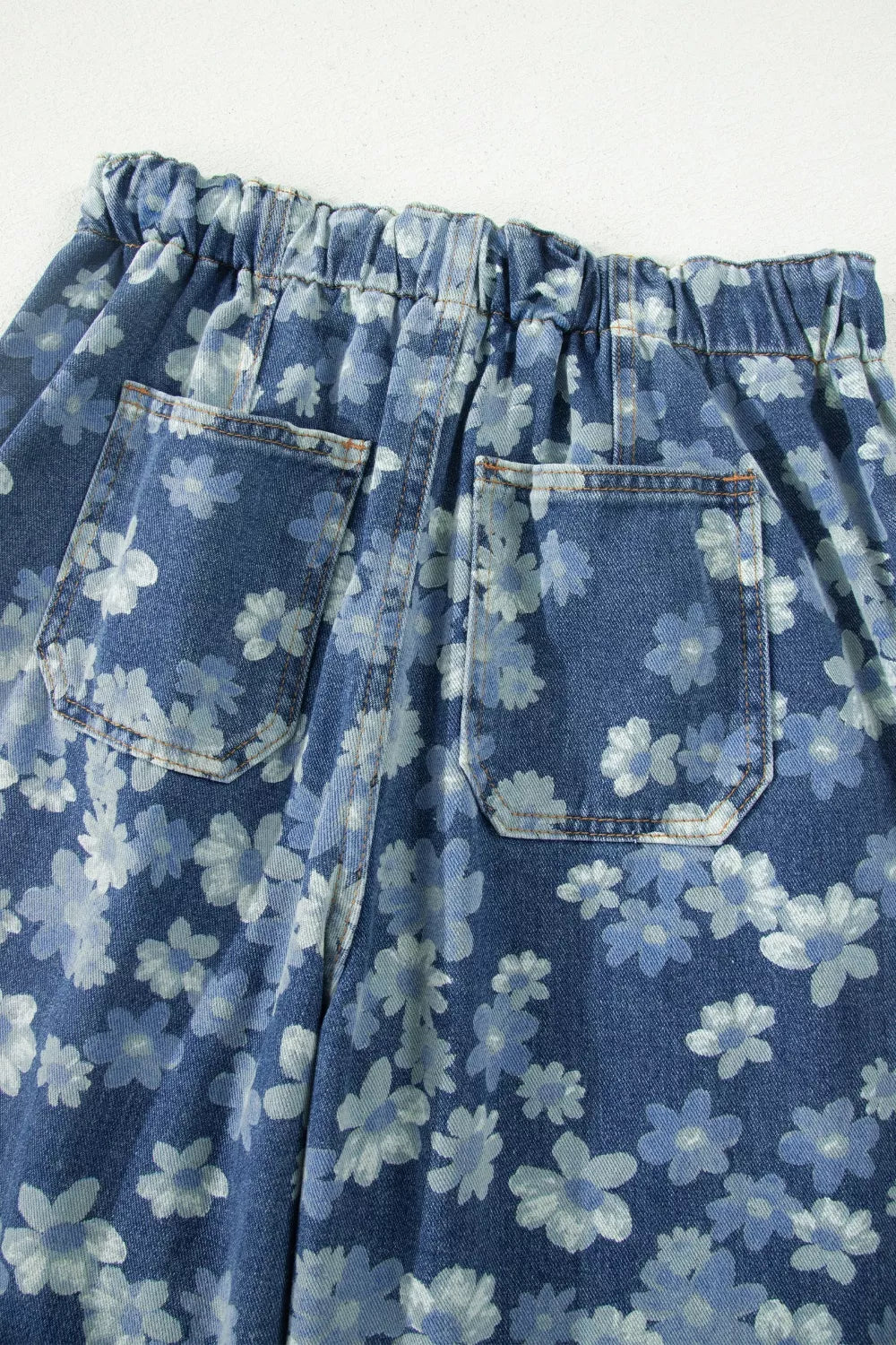 Dainty floral printed drawstring barrel jeans by Plush Fashion Hub, featuring a stylish floral design and relaxed fit.