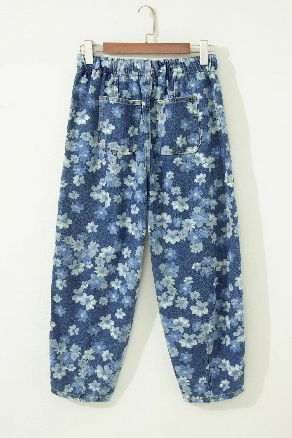 Dainty floral printed drawstring barrel jeans by Plush Fashion Hub featuring a relaxed fit with floral design and drawstring waist.