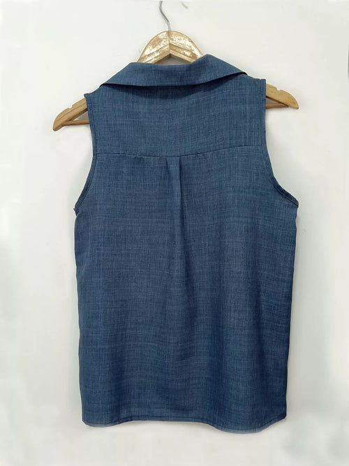 Plus size sleeveless button-up collared neck top from Trendsi, featuring a full-size sleeveless blouse with a classic collar.