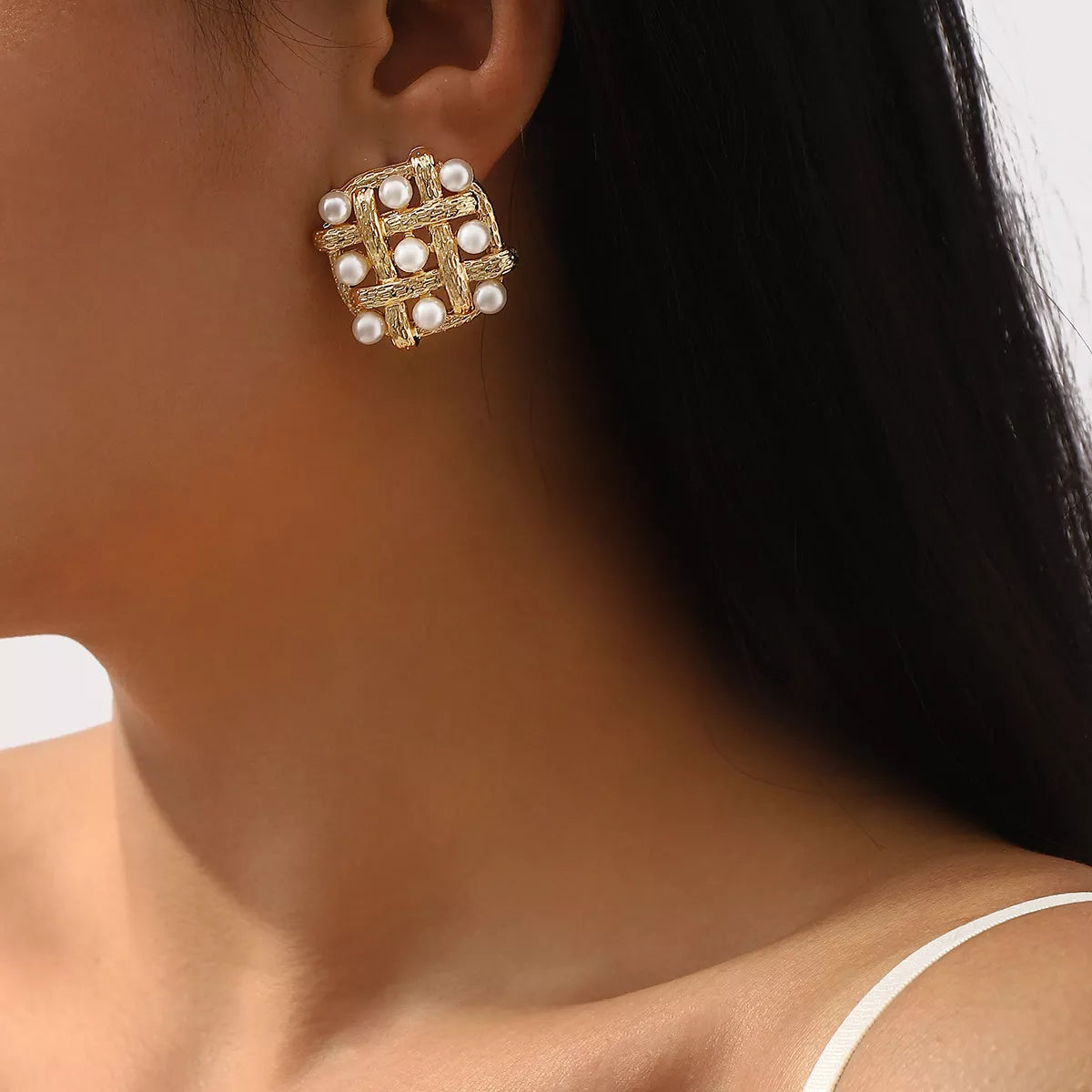 Pearl grid square stud earrings by Plush Fashion Hub featuring elegant white pearls on a sleek square design.