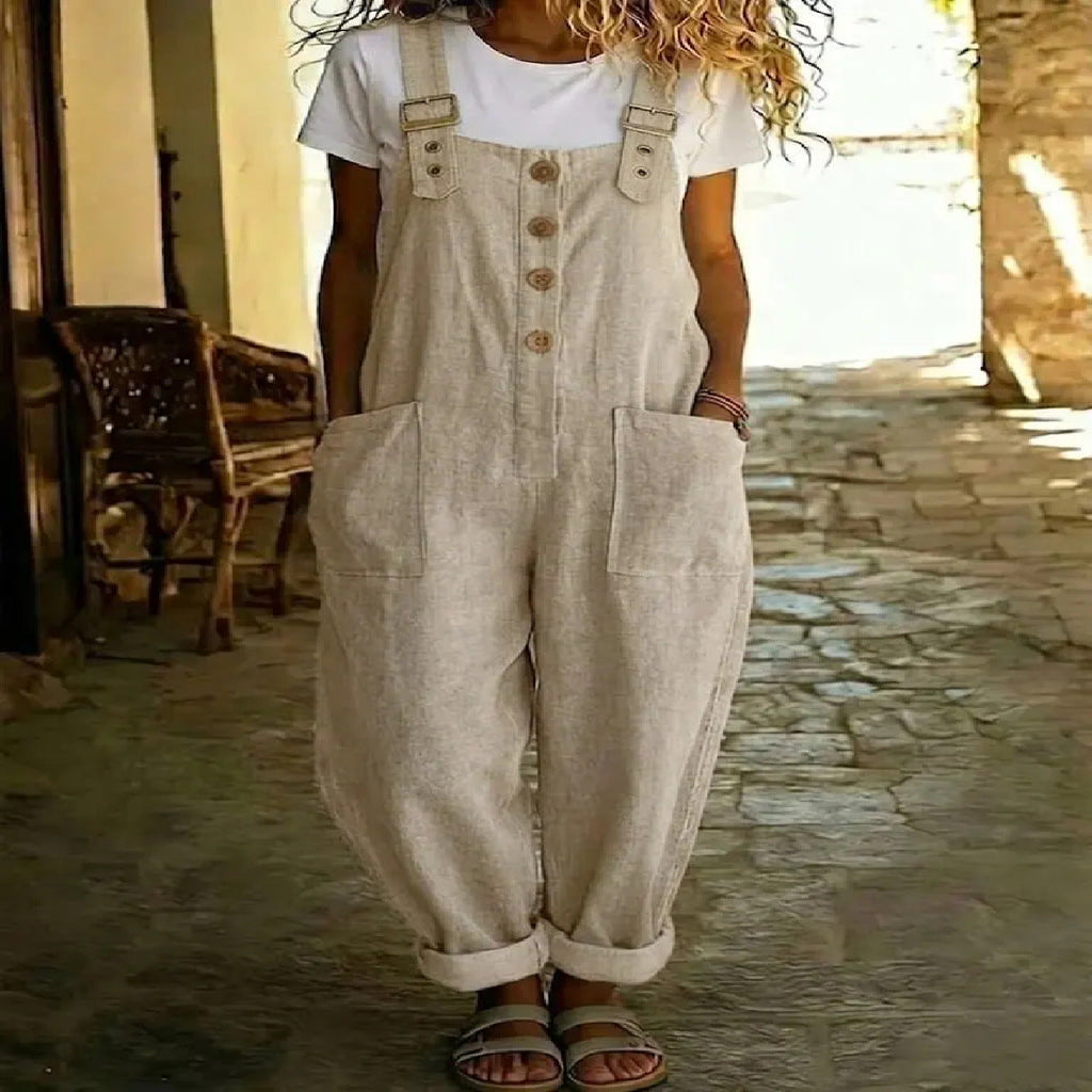 Women's vintage high-waist straight-leg sleeveless jumpsuit with suspenders, from Plush Fashion Hub, styled for a retro look.