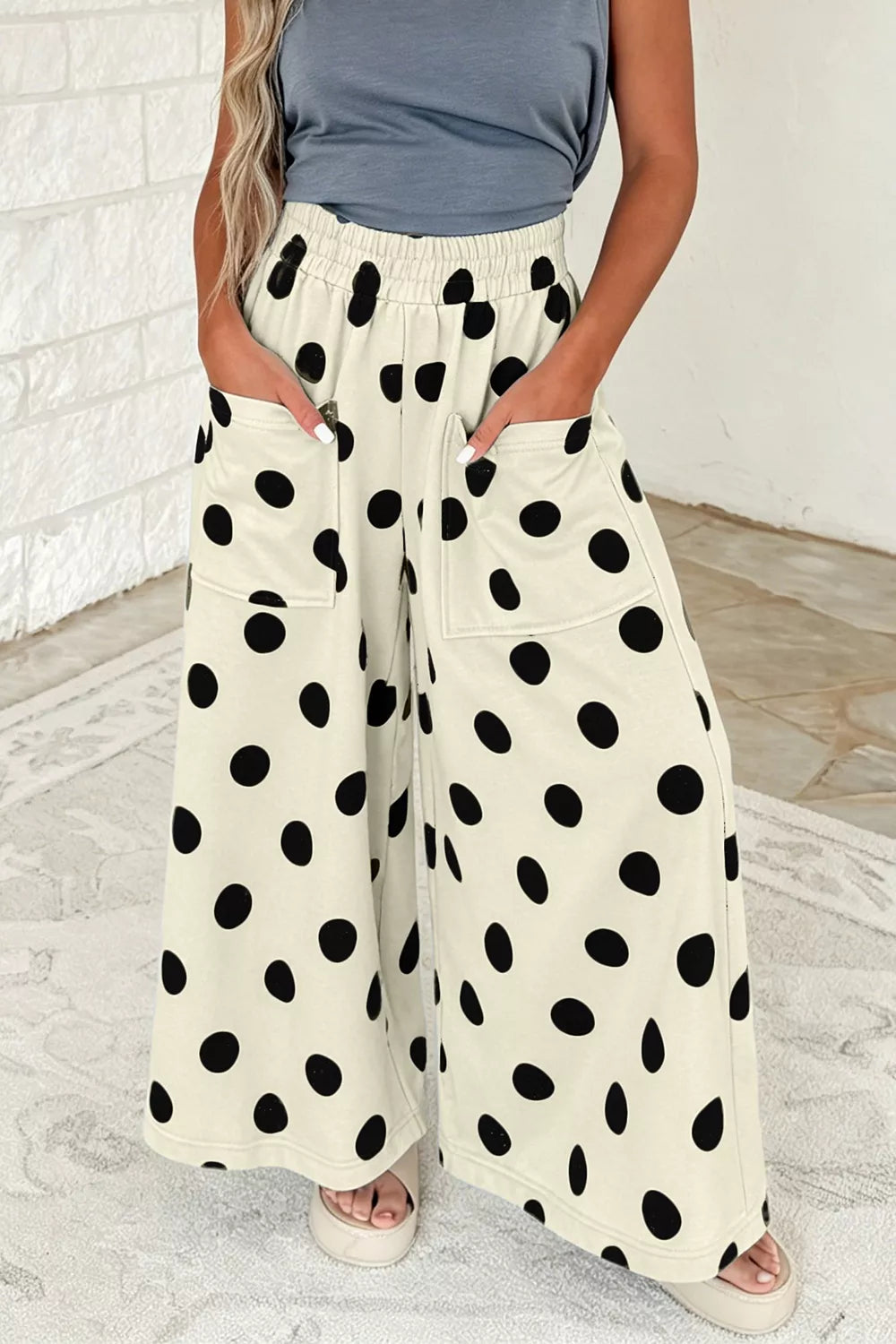 Polka dot wide-leg casual pants with elastic waistband from Trendsi, featuring a relaxed fit and stylish pattern.
