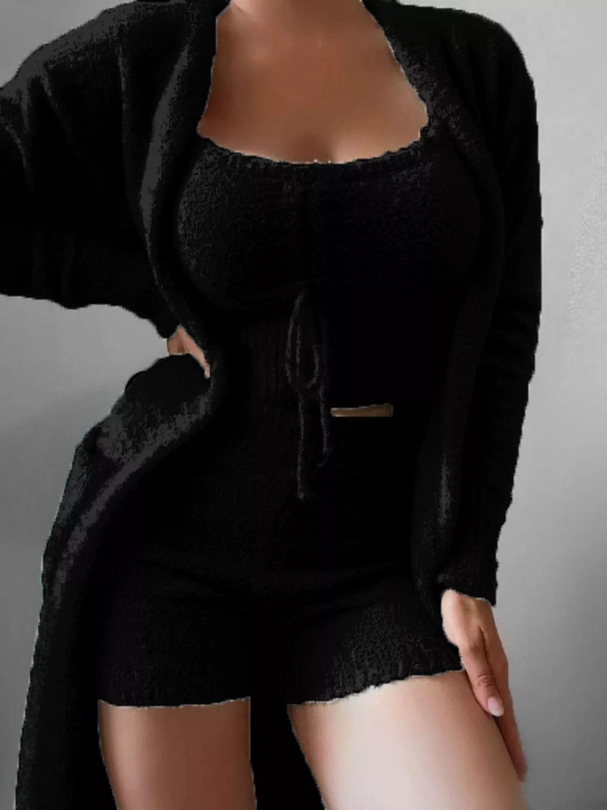 Plus size cozy plush cardigan top and shorts set from Trendsi, featuring soft, warm fabric and a comfortable, relaxed fit.