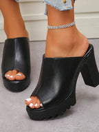 Women's chunky platform block heel sandals in faux leather, trendy shoe with ankle straps and open toe design from Trendsi