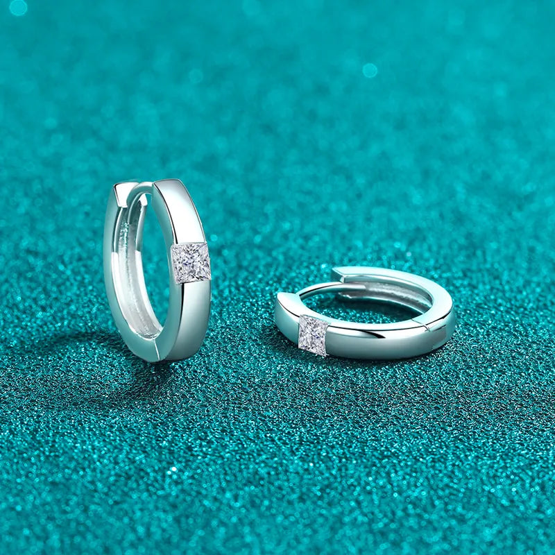 Sterling silver Moissanite huggie earrings with sparkling gemstones, stylish jewelry by Plush Fashion Hub.