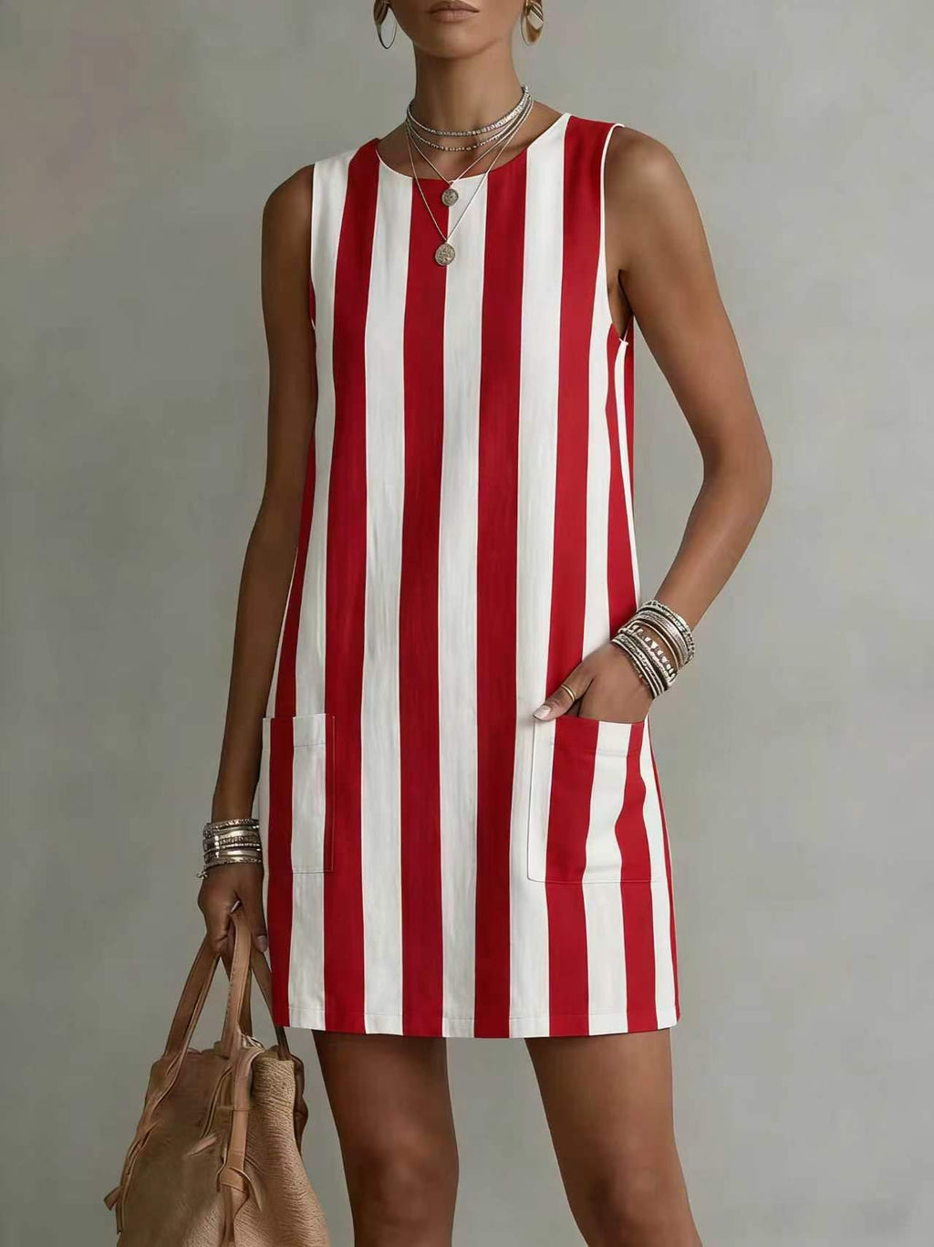 Women's striped color-block sleeveless mini dress in loose fit, casualwear by Plush Fashion Hub, featuring vibrant color blocks and a relaxed style.