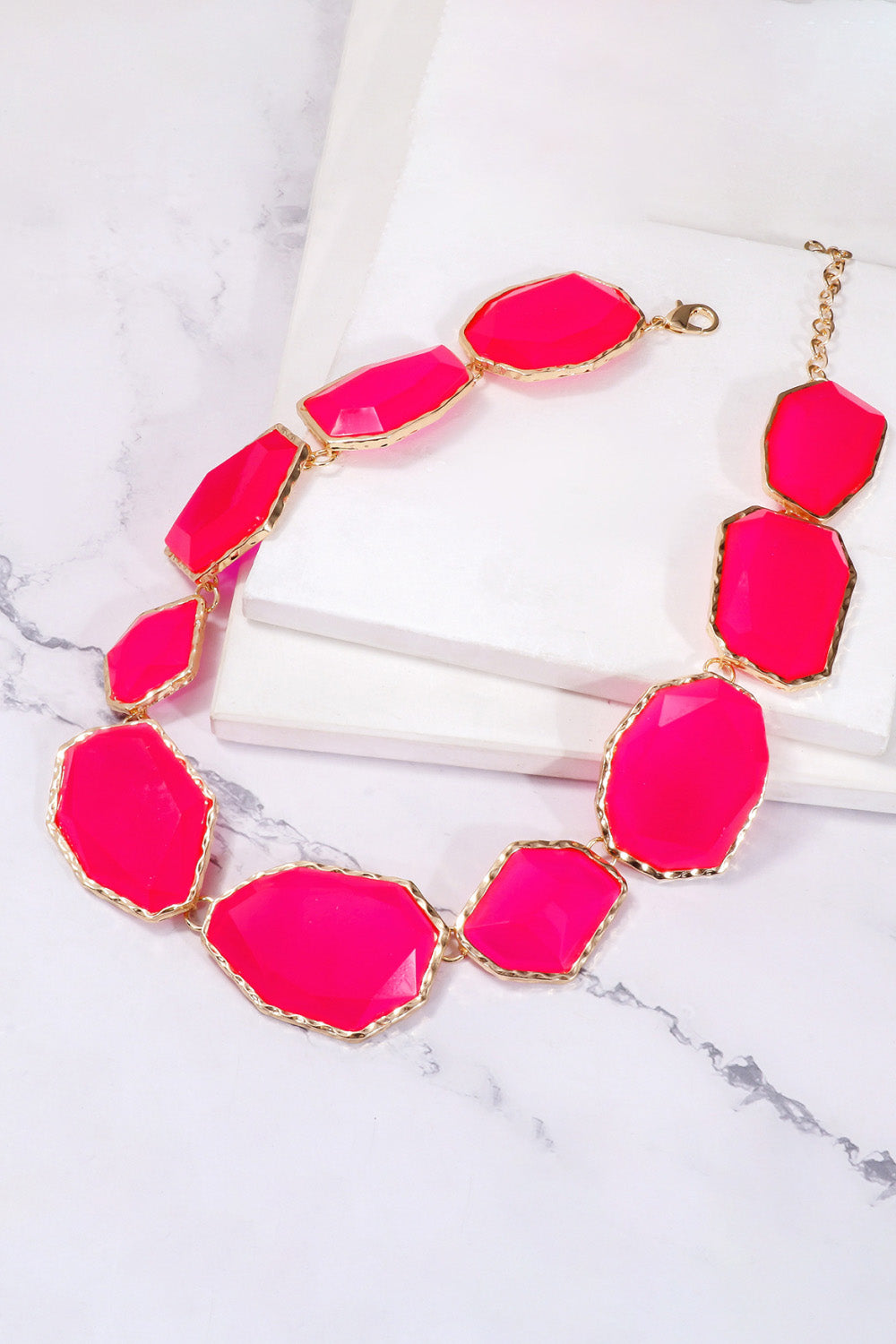 Geometrical resin necklace with zinc alloy frame, featuring colorful, modern design jewelry from Plush Fashion Hub.