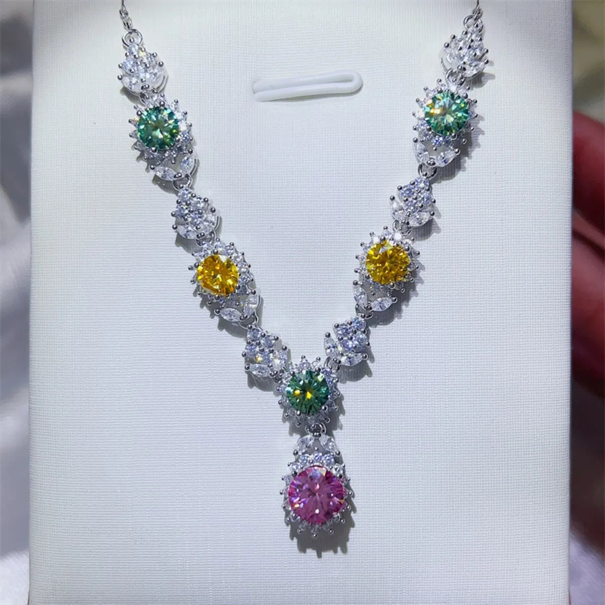 Sterling silver necklace with a 3.5 carat moissanite gemstone, elegant jewelry piece by Plush Fashion Hub.