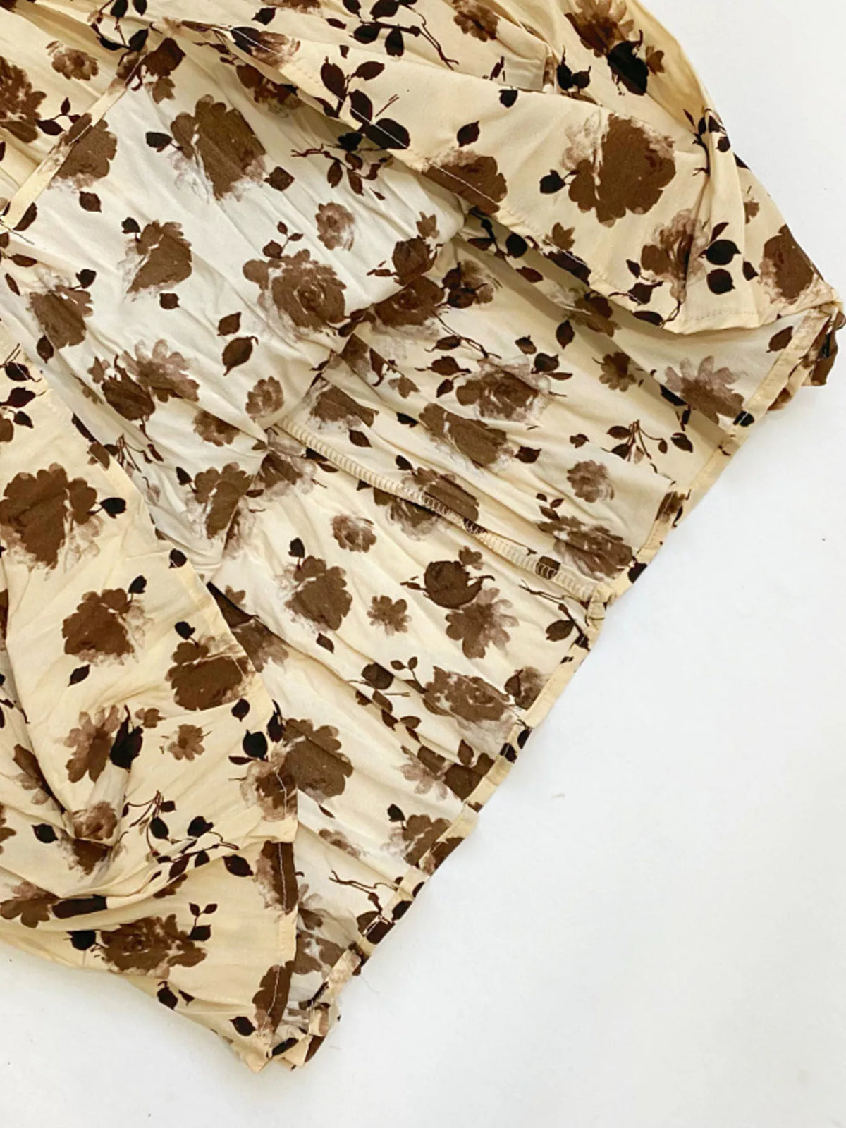 Floral print elastic waist midi skirt by Plush Fashion Hub, featuring a flowy design and vibrant floral patterns.
