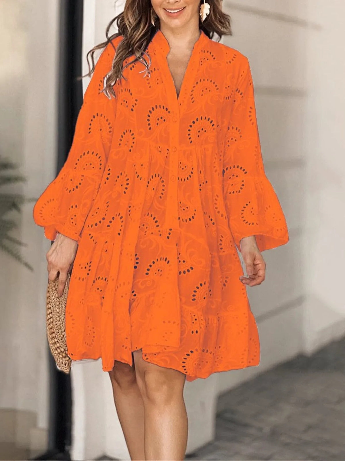 Plus size full-length eyelet ruffled hem tiered dress by Trendsi, showcasing its flowing layers and elegant design.
