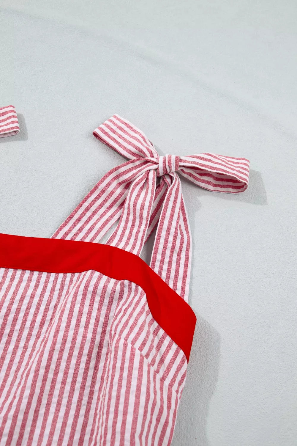 Plush Fashion Hub maxi dress with stripe bow knot straps, contrast trim, high waist, and ruffle hem in a stylish design.