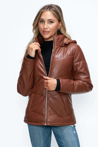 Pocketed zip up brown puffer jacket with removable hood and convenient pockets.