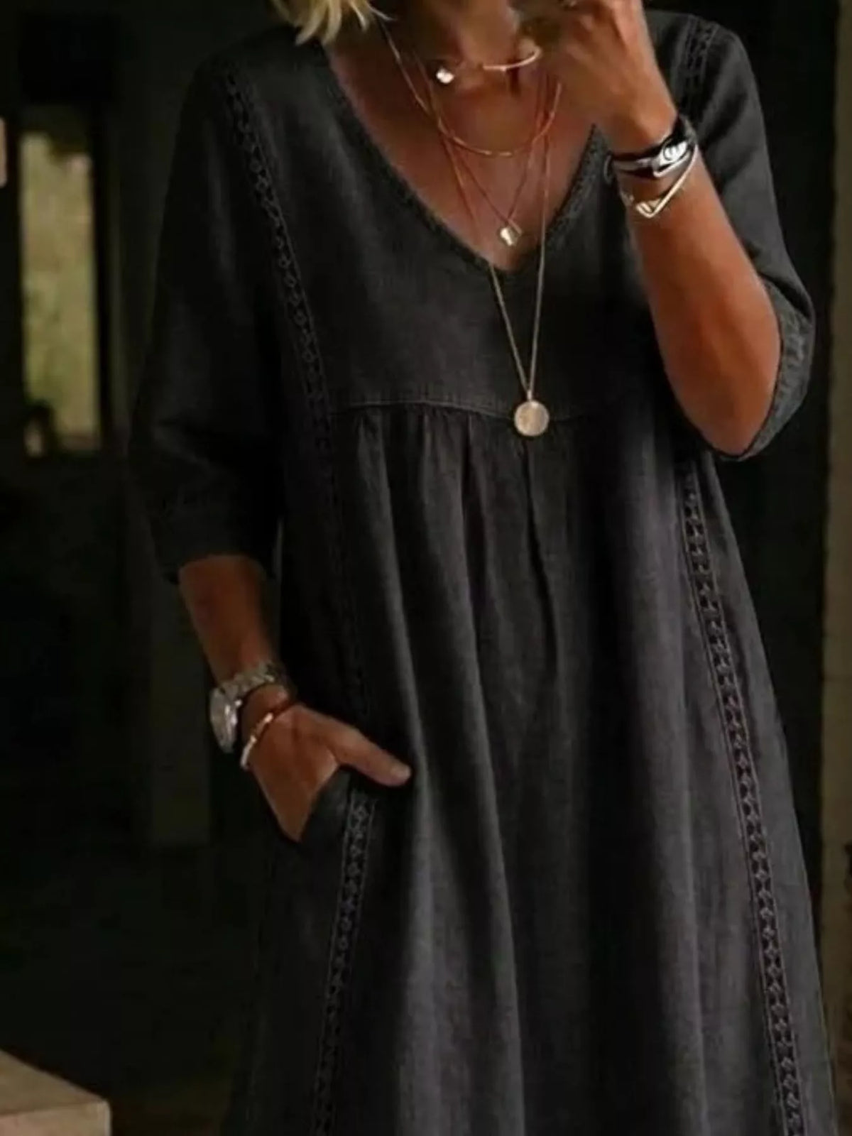 Plus size full-length midi dress with V-neck and 3/4 sleeves from Trendsi, featuring a stylish, flowing silhouette.