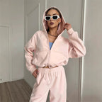 Women’s casual sportswear set by FitiqueFit featuring a solid color cardigan and matching top and bottom for active wear.