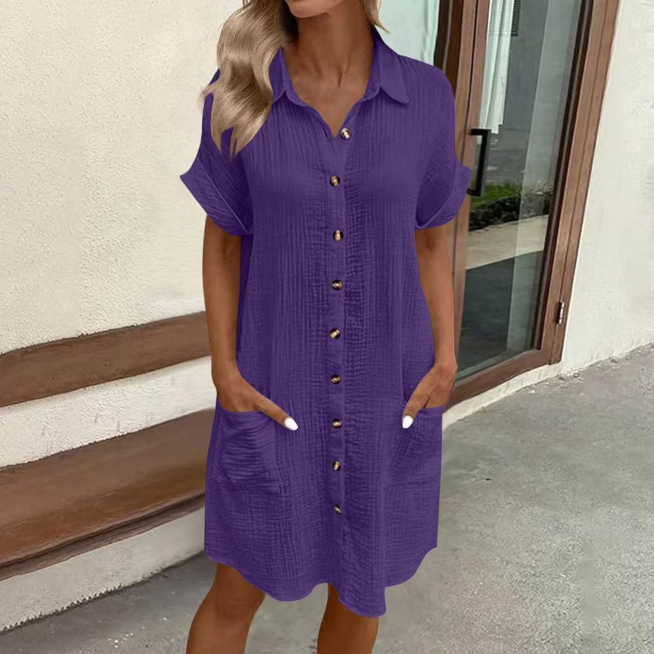 Women's casual FitiqueFit loose short-sleeve midi shirt dress with button-down front, shown hanging on a wooden hanger.