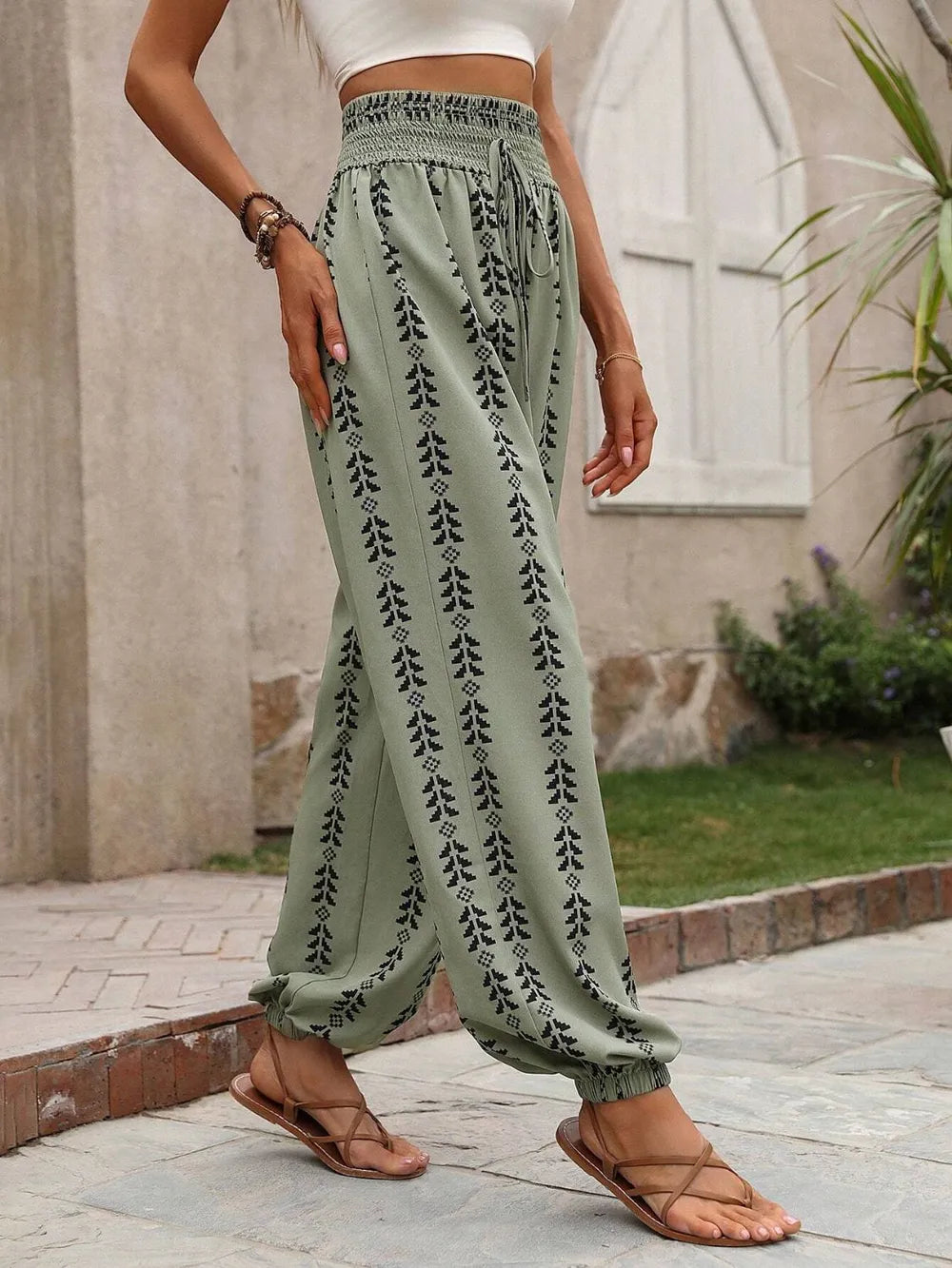 Plush Fashion Hub printed high waist pants with a relaxed fit and stylish design, shown on a model.