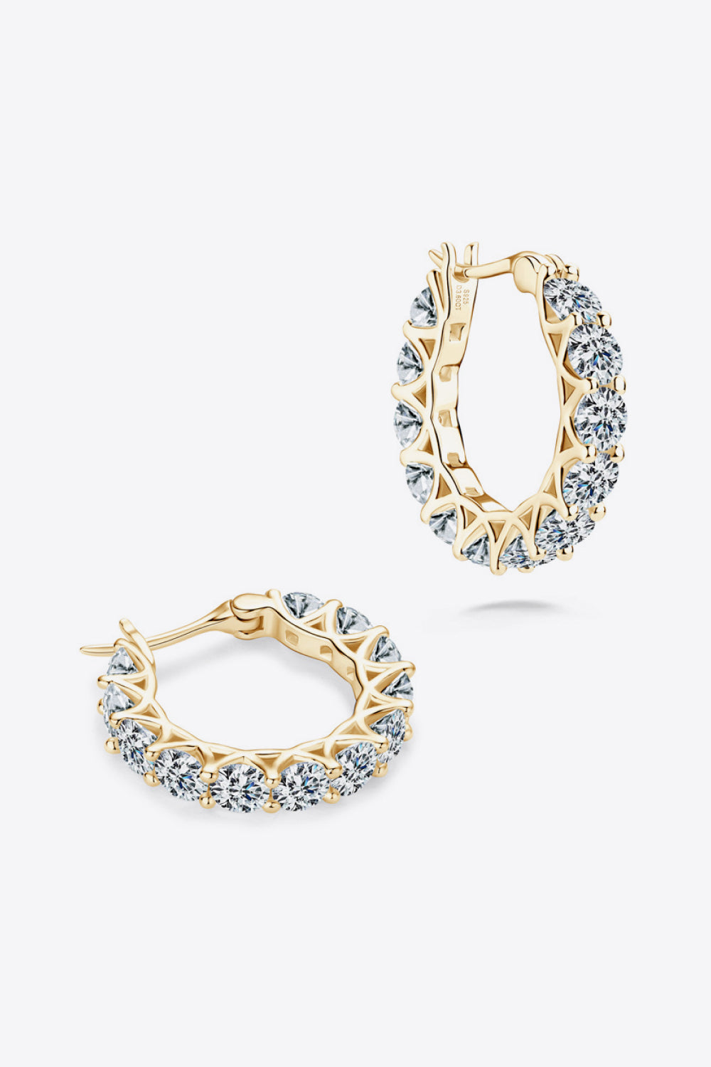 Sterling silver moissanite earrings with 7.2 carats, featuring sparkling gemstone accents and elegant jewelry design.
