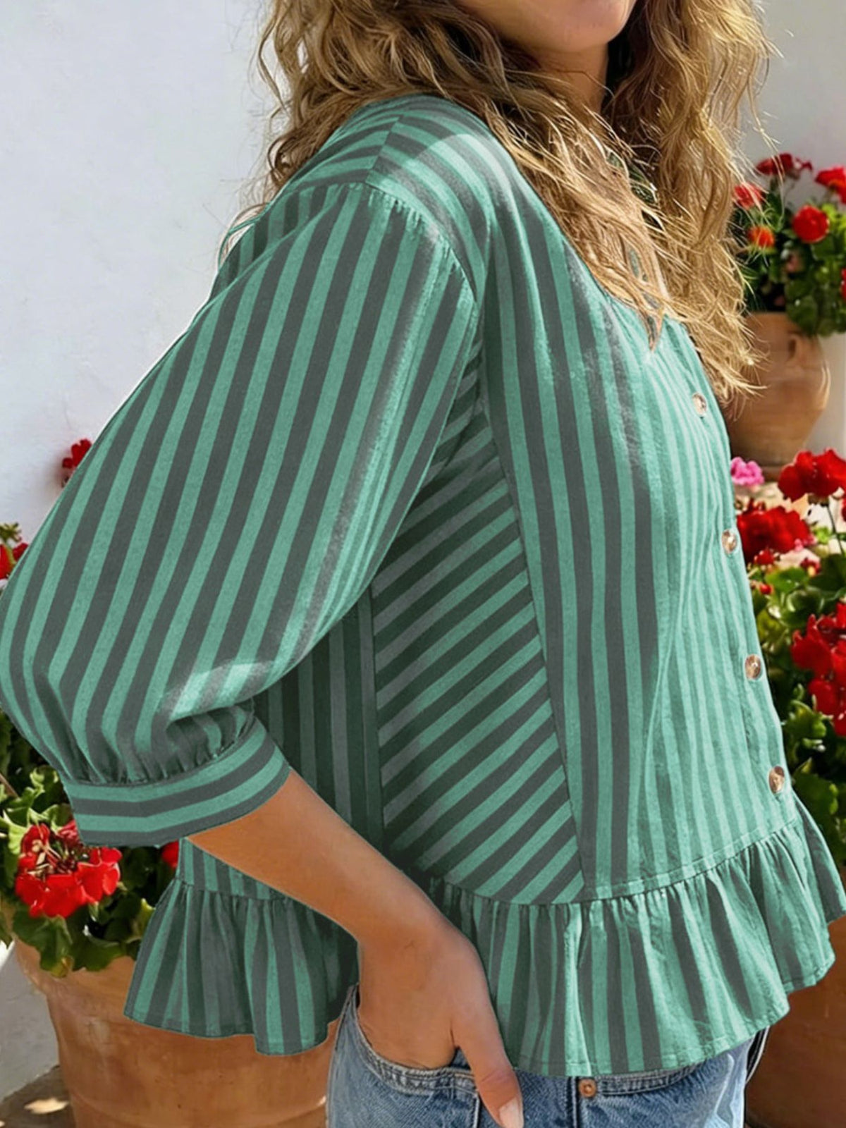 Women’s striped button-down blouse by Plush Fashion Hub, lightweight viscose fabric with ruffled hem and casual fit.