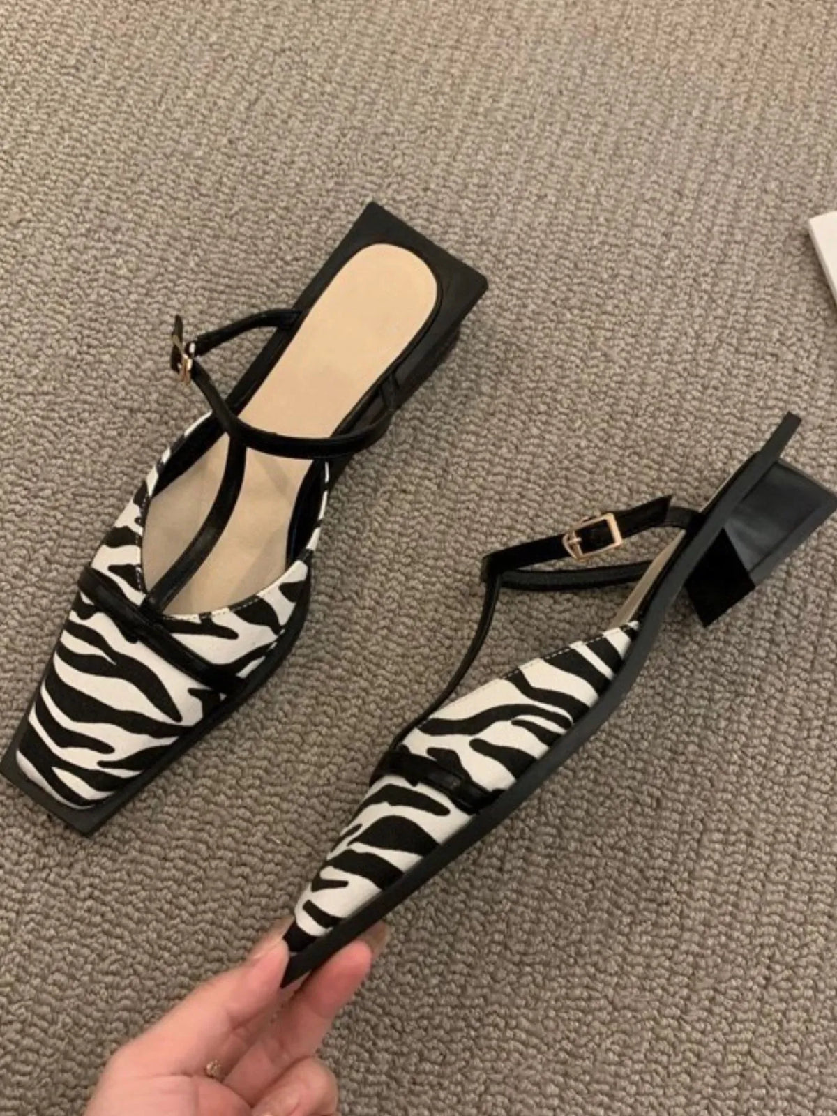 Women's square toe T-strap sandals by Trendsi, featuring stylish straps and a comfortable flat sole.