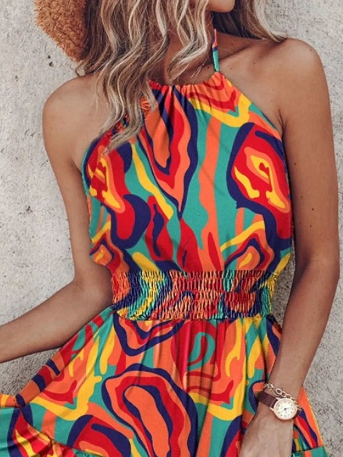 Paisley print halter neck mini dress by Plush Fashion Hub, featuring a stylish design and vibrant pattern.