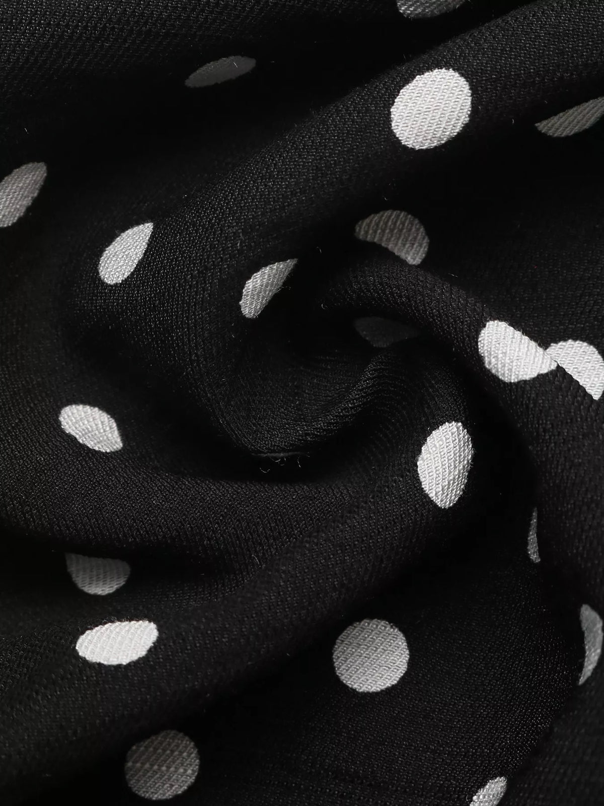 Polka dot ruffle hem spaghetti strap dress by Plush Fashion Hub, featuring a playful dotted pattern and feminine ruffle details.