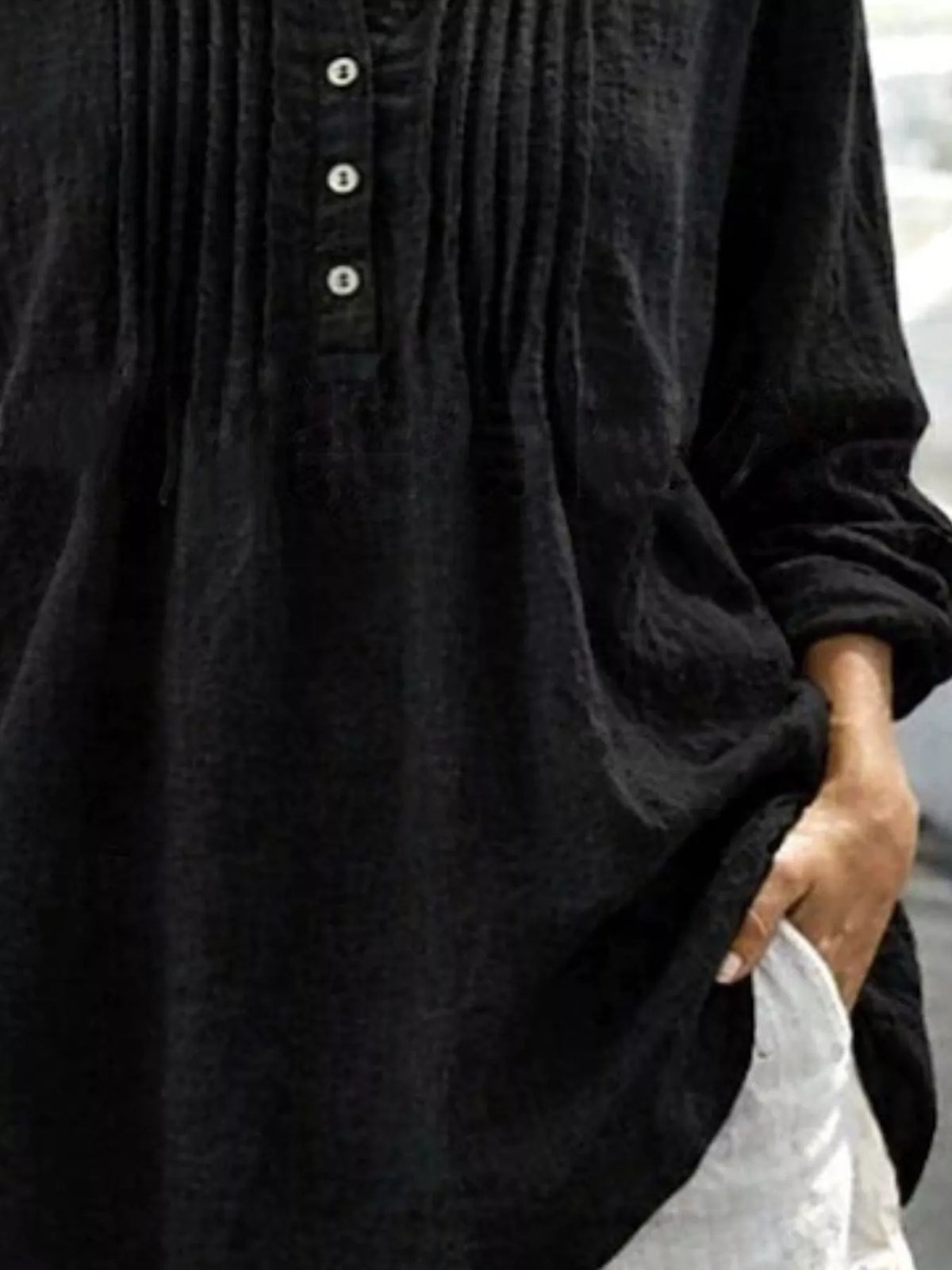Casual long sleeve linen shirt with button details from Trendsi, featuring a relaxed fit and breathable fabric, displayed on a mannequin.