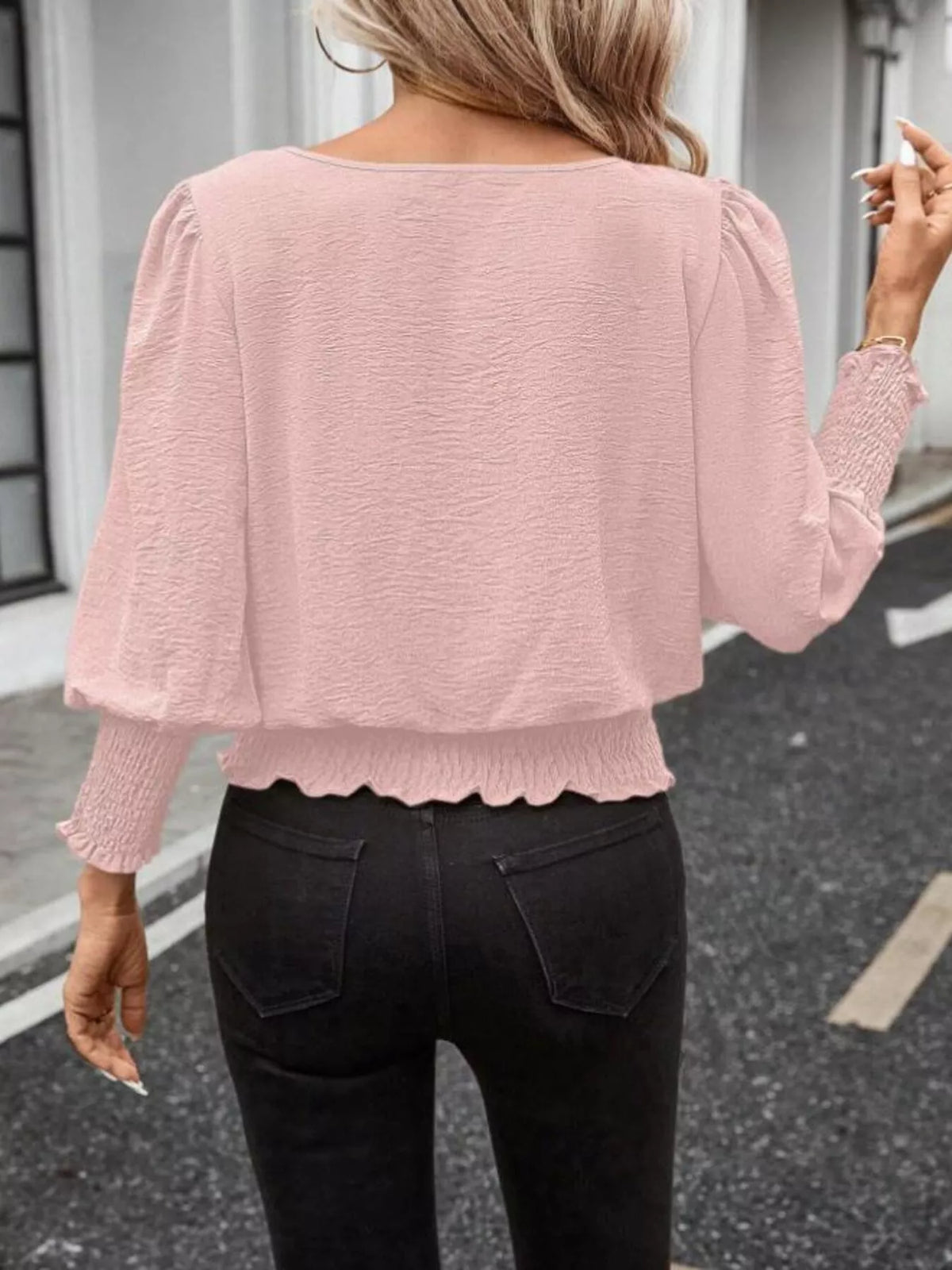 Plush Fashion Hub puff sleeve smocked blouse with ruffled details and floral pattern, lightweight and stylish for casual wear.