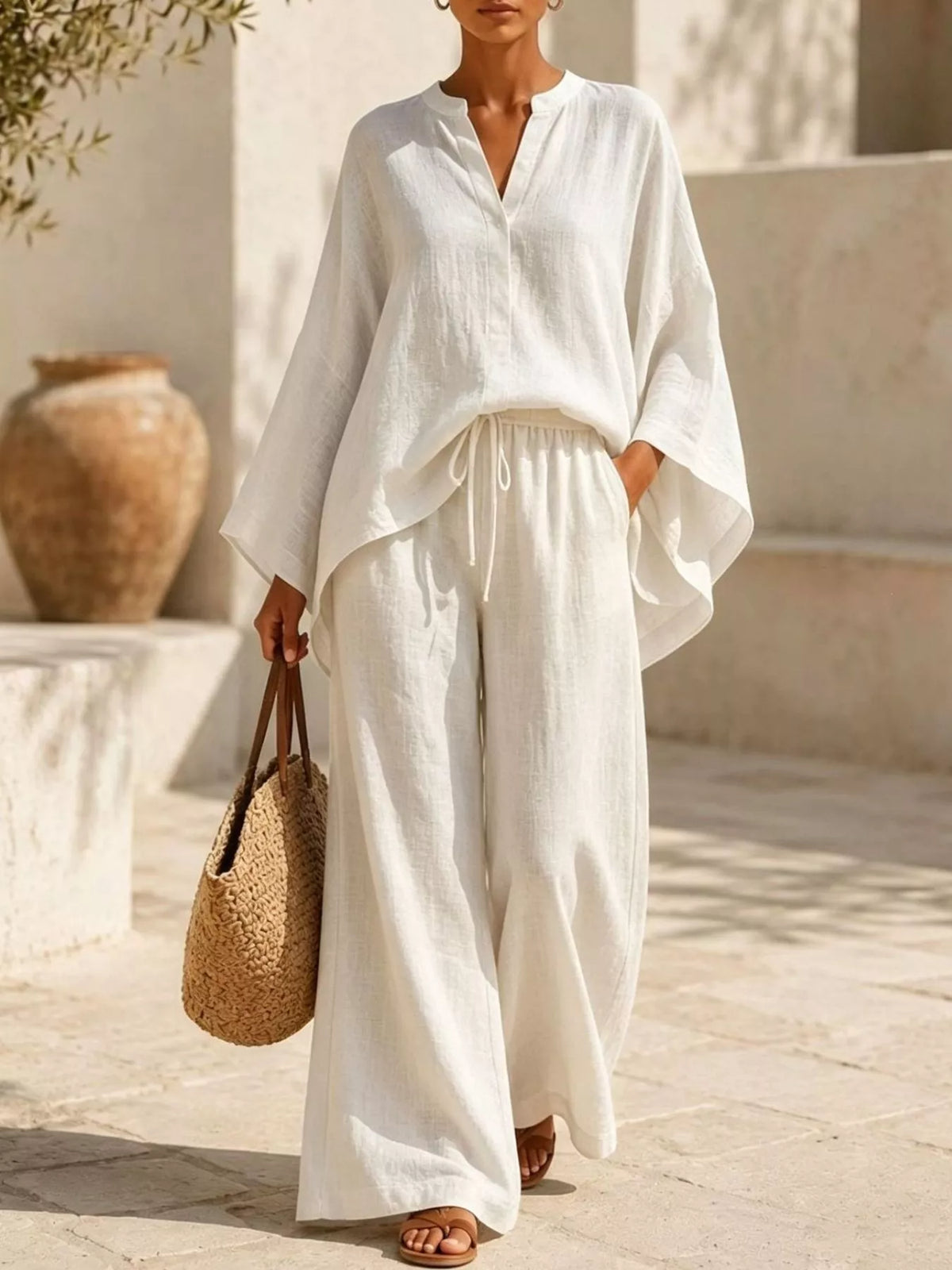 Plus size full notched long sleeve top and wide-leg pants loungewear set by Plush Fashion Hub, shown in a relaxed fit and comfortable fabric.