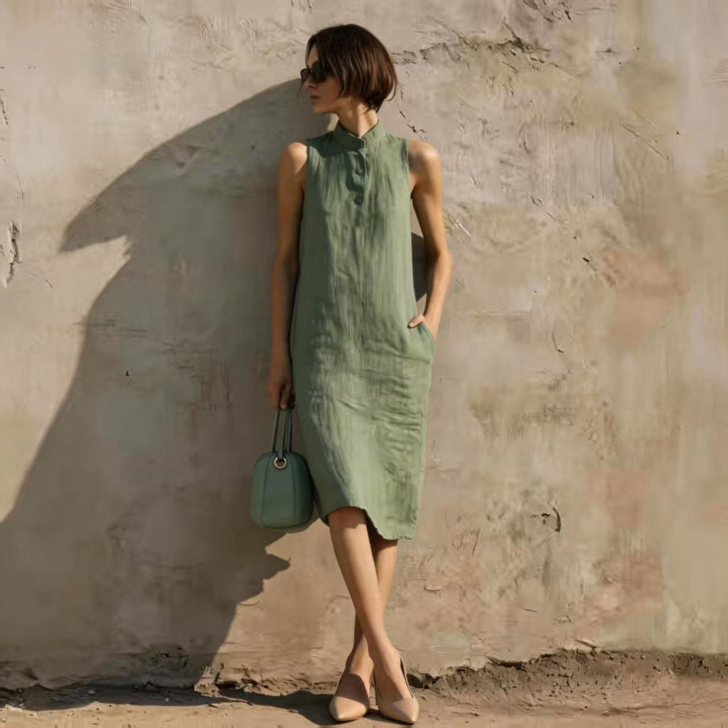 Women's sleeveless A-line midi dress in solid cotton linen fabric, featuring a casual, relaxed fit perfect for summer wear.