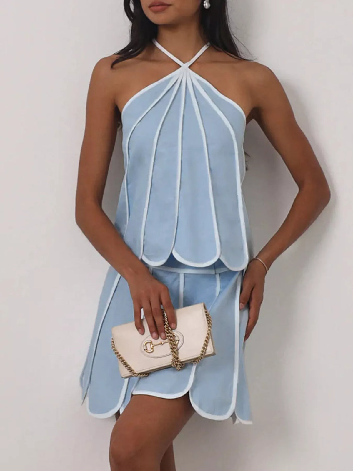 Contrast trim halter neck top and skirt set by Plush Fashion Hub, featuring a stylish matching ensemble with bold design details.