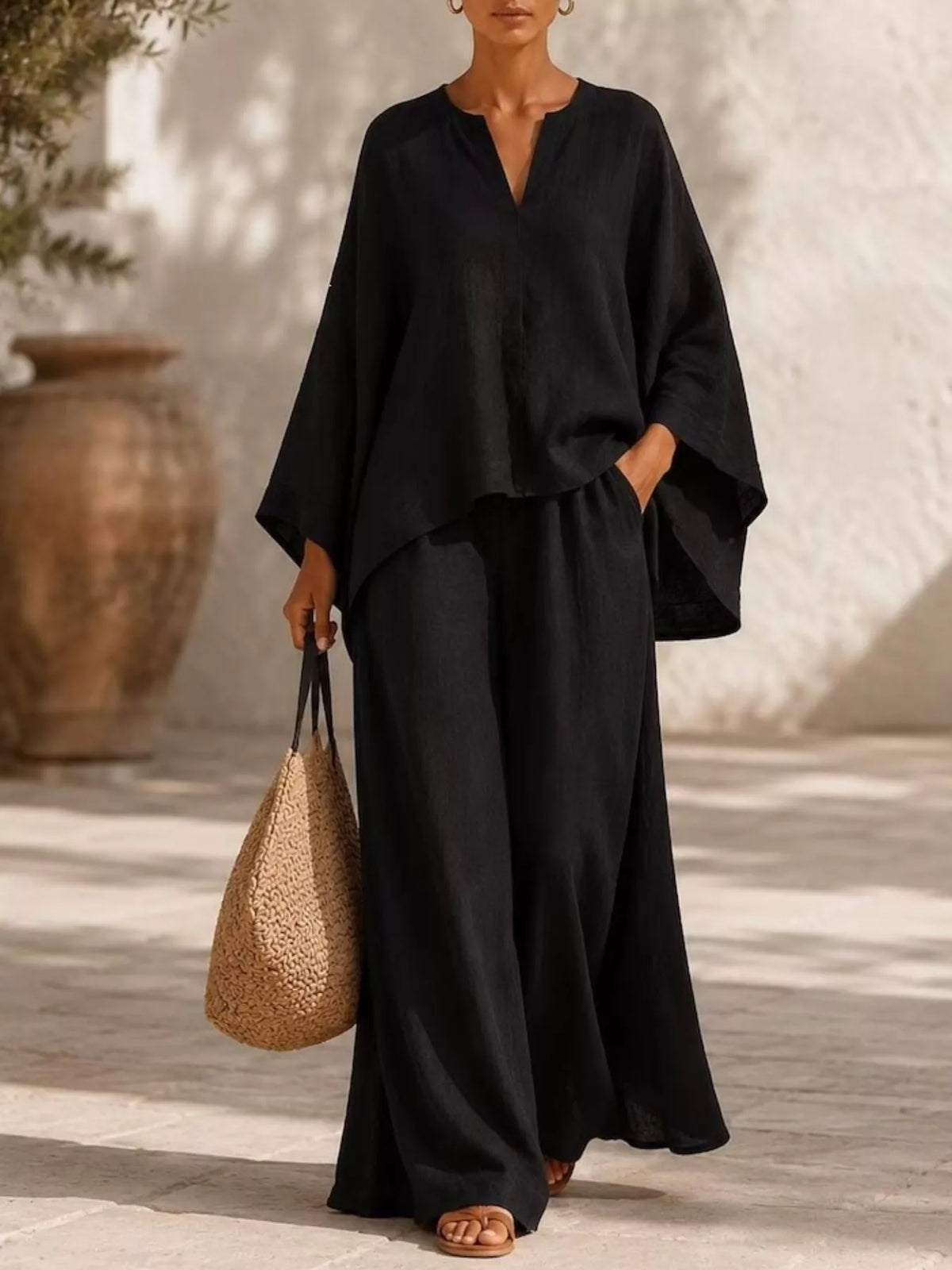 Plus size full notched long sleeve top and wide-leg pants loungewear set from Plush Fashion Hub, shown on model with cozy fabric.