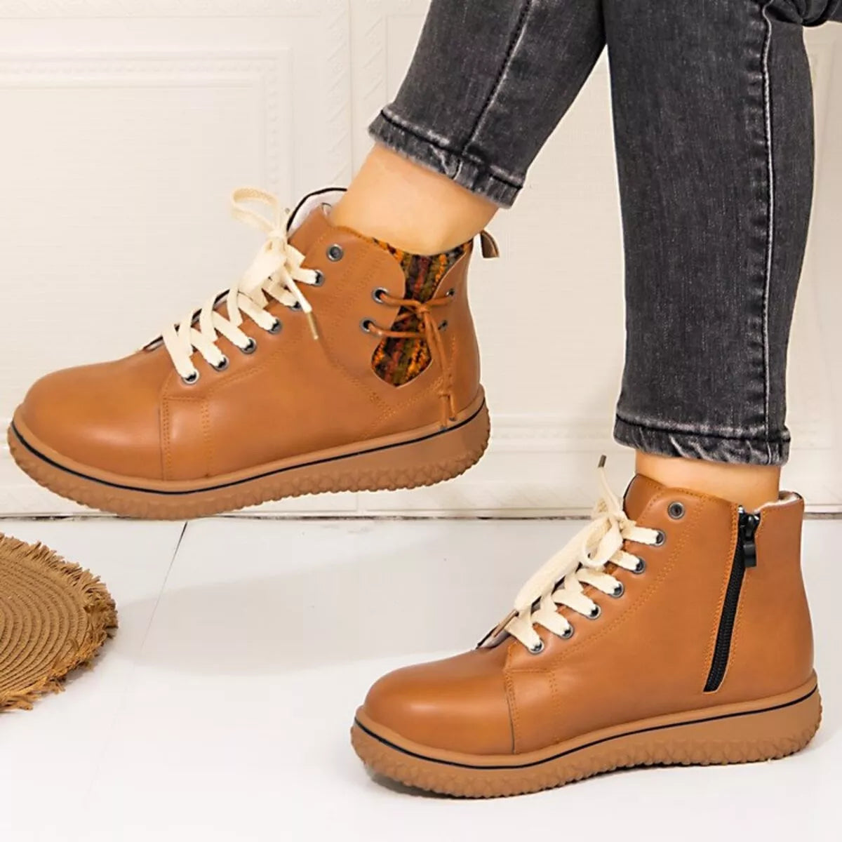 Women's round toe platform ankle boots by Trendsi, featuring a stylish design with chunky heels and ankle height in black leather.
