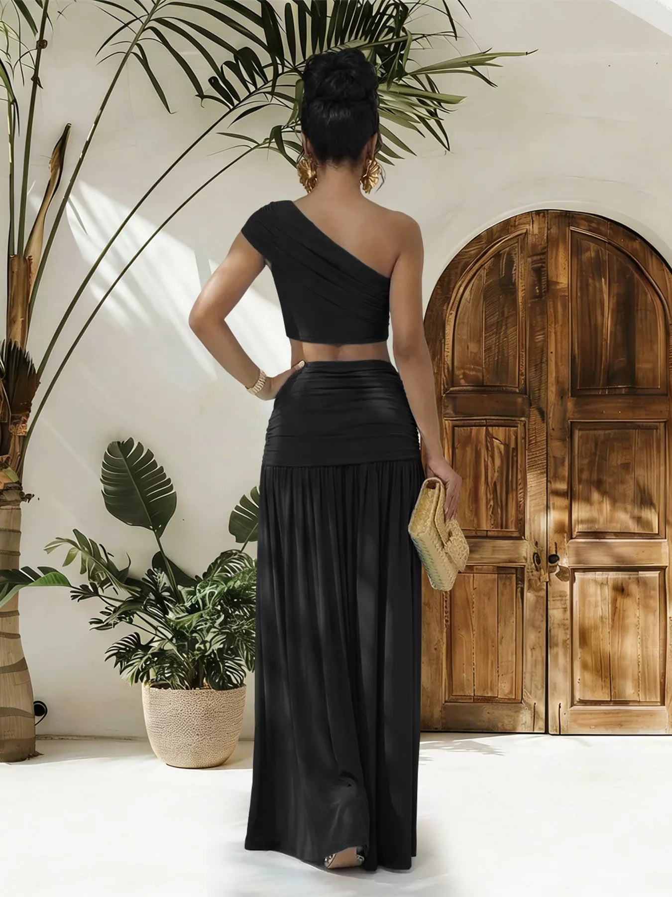 Trendsi one-shoulder top with matching ruched maxi skirt set, stylish and elegant fashion ensemble for women.