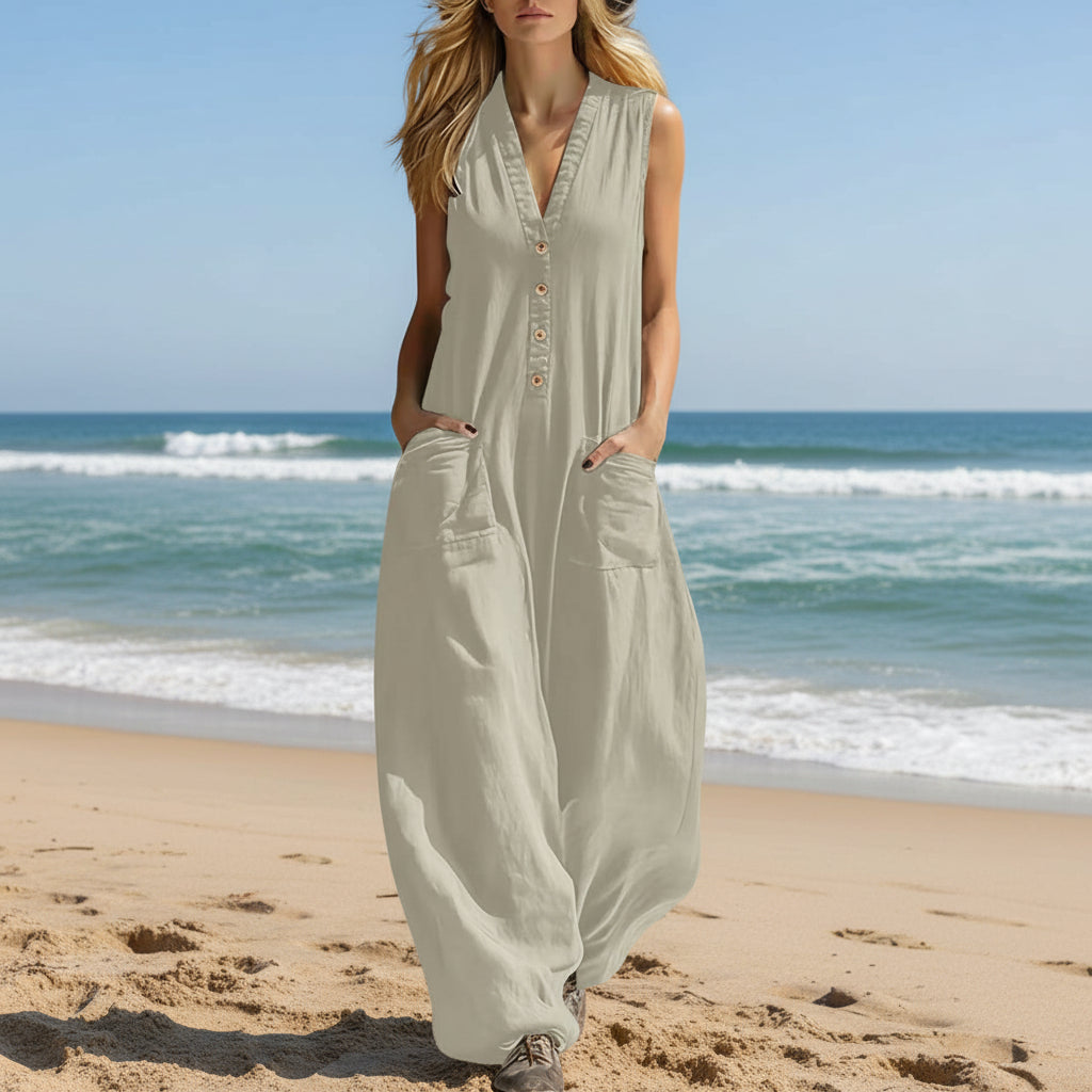 Women's sleeveless wide-leg jumpsuit with pockets, casualwear by FitiqueFit, featuring a relaxed fit and stylish design.