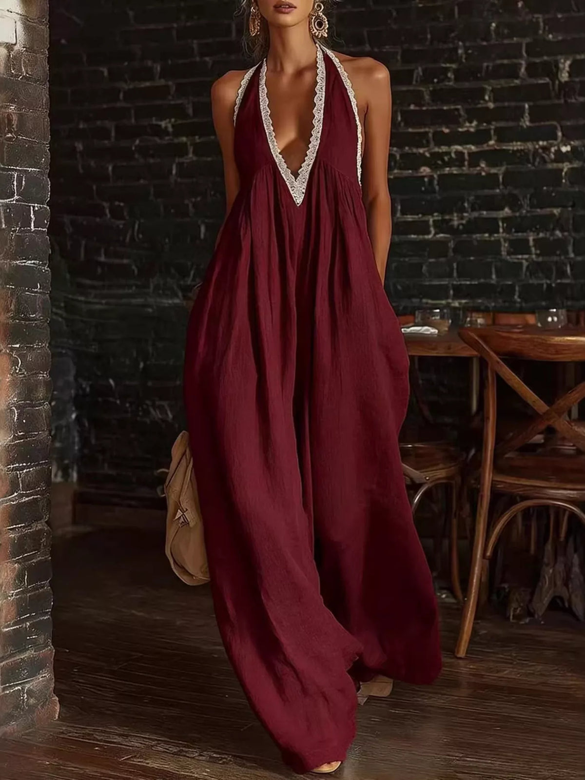 Plus size halter neck lace trim wide-leg jumpsuit by Plush Fashion Hub, showcasing the stylish full-length playsuit with lace details.