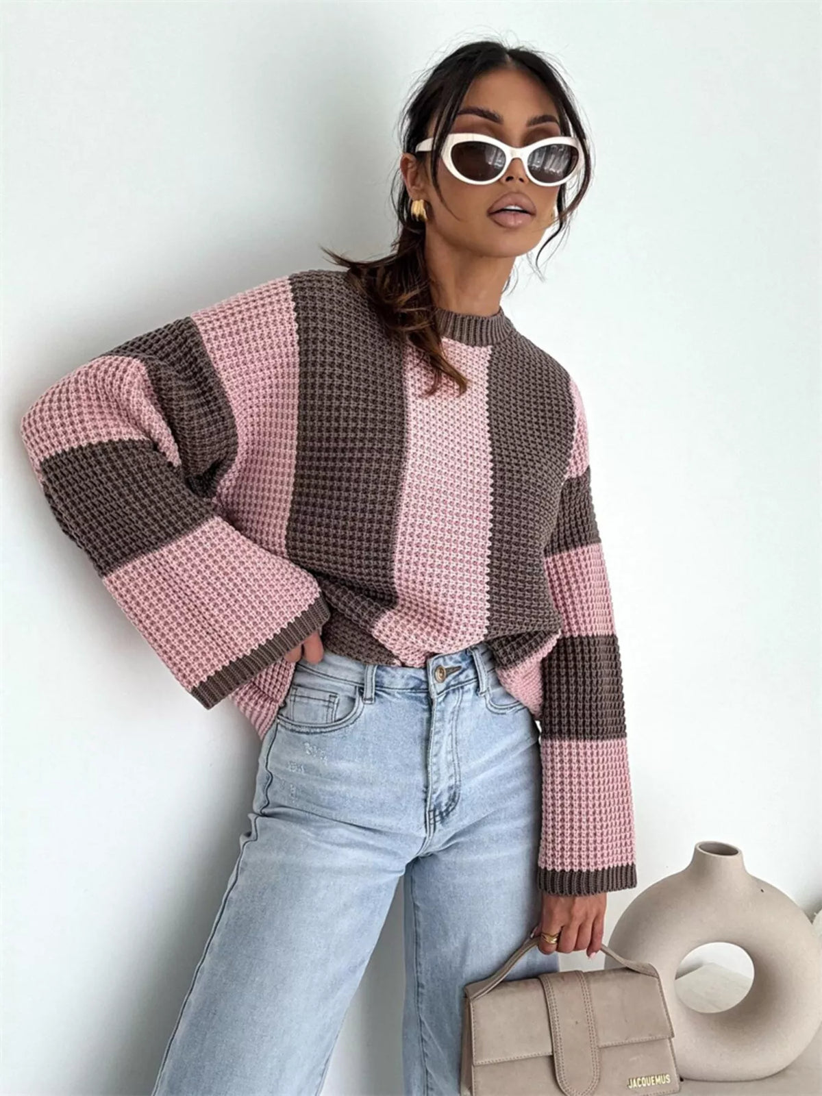 Color block long sleeve sweater by Trendsi featuring vibrant color blocking and a cozy knit design.