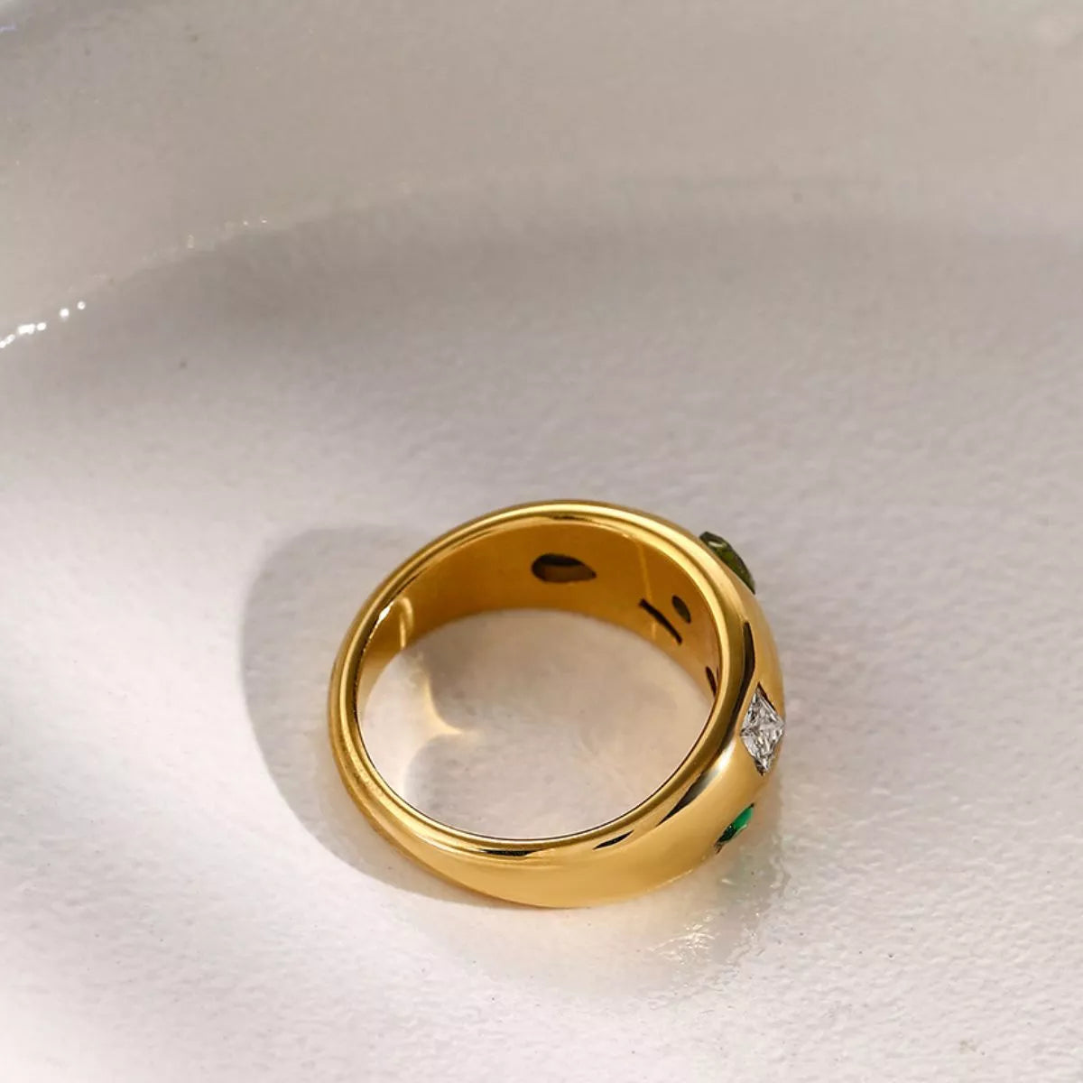 Colorful zircon ring with 18K gold-plated finish, showcasing vibrant stones and elegant design in a jewelry image.