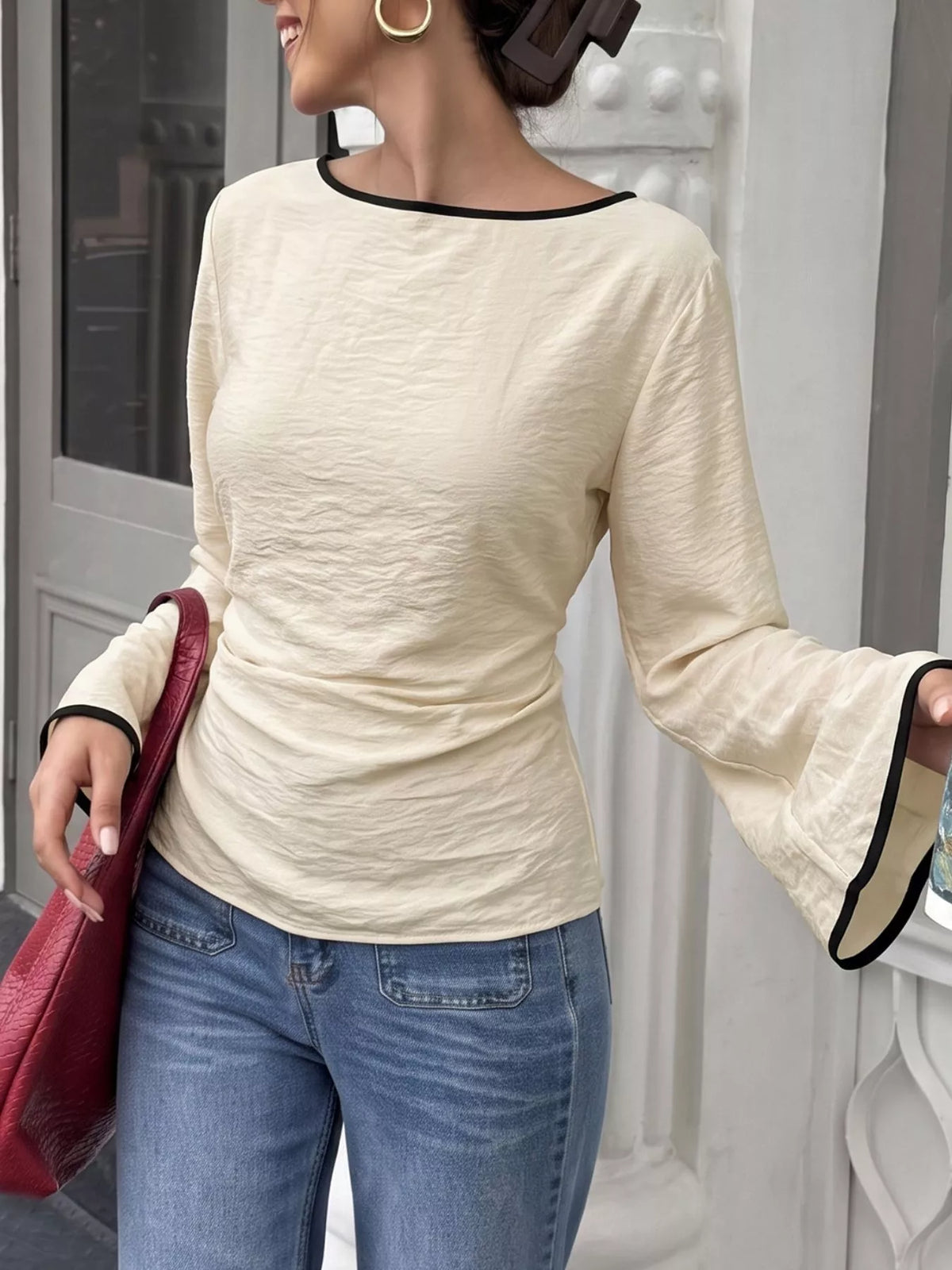 Plush Fashion Hub contrast trim flare sleeve blouse with stylish design, featuring wide sleeves and a flattering fit.