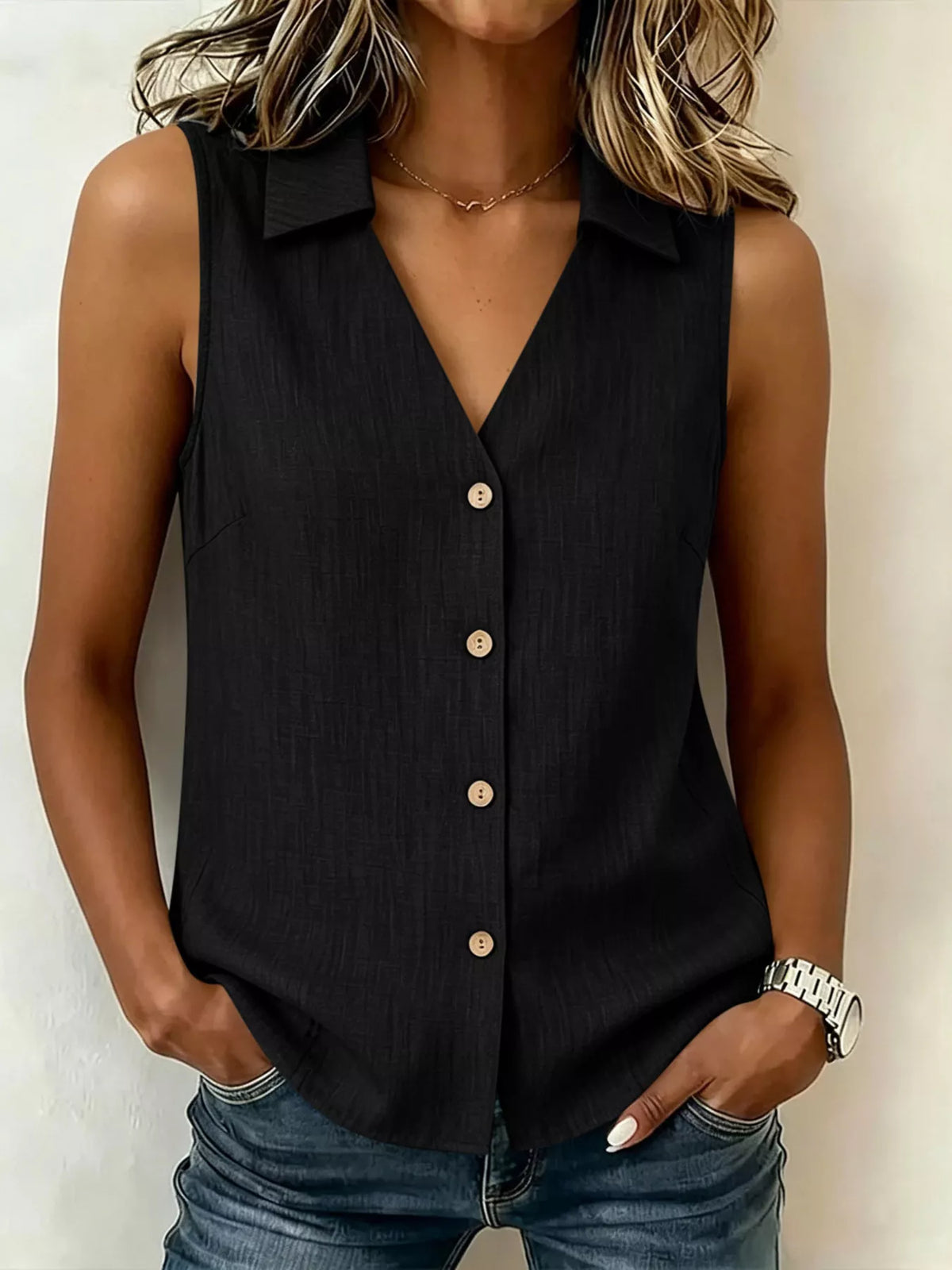 Plus size sleeveless button-up collared top by Trendsi, shown in a full front view with crisp fabric and classic design.