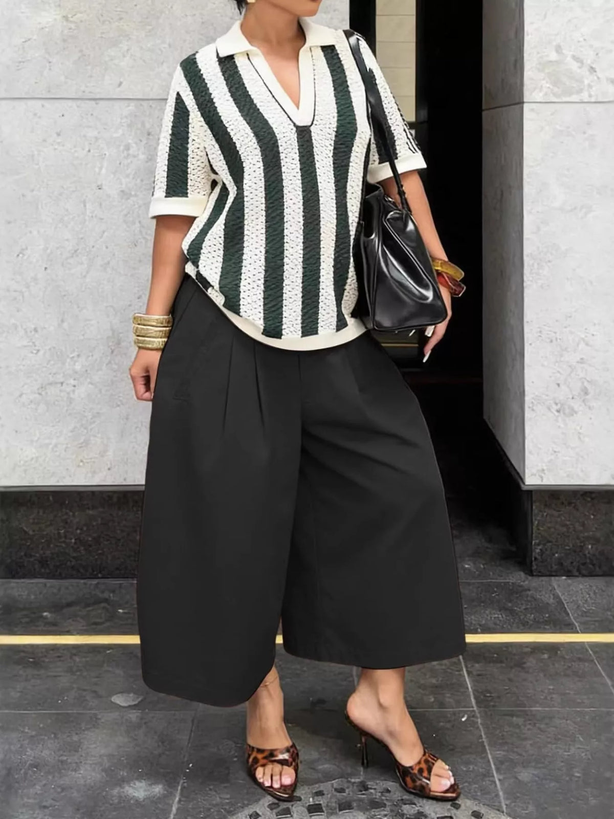 Plush Fashion Hub wide-leg cropped pants in soft fabric, featuring a relaxed fit and stylish design.