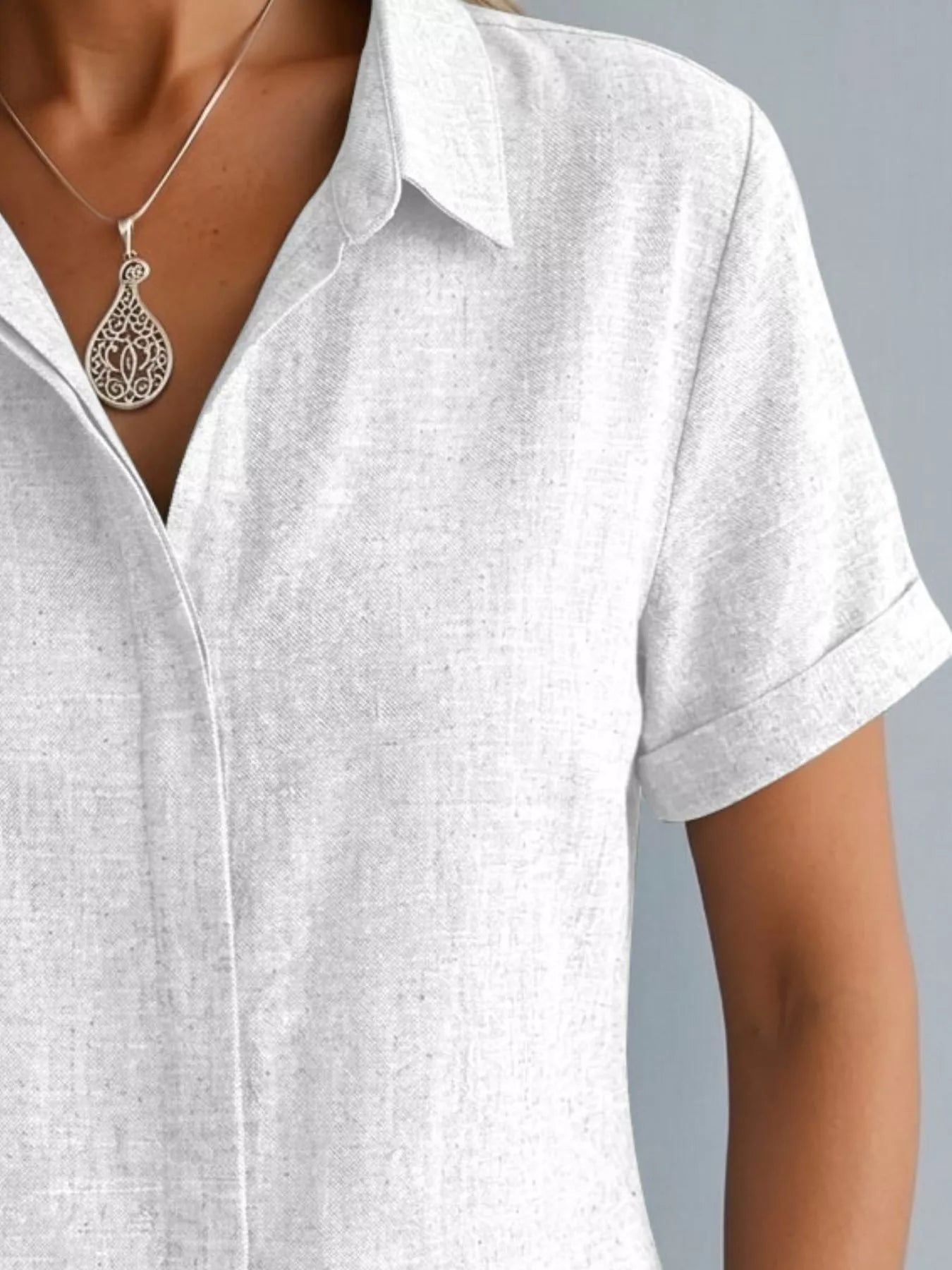 Plus size collared short sleeve shirt from Trendsi, casual tops with a classic collar and comfortable fit, full-size available.