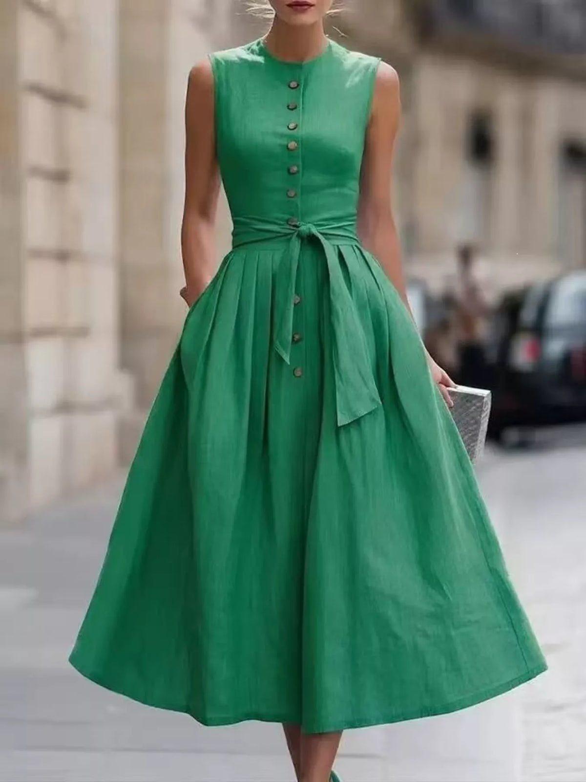 Plus size sleeveless button-front belted midi dress by Trendsi, featuring a stylish full-length design and a flattering fit.