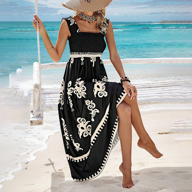 Women’s wide-strap printed maxi dress by FitiqueFit, casualwear with colorful floral pattern and flowing fabric.