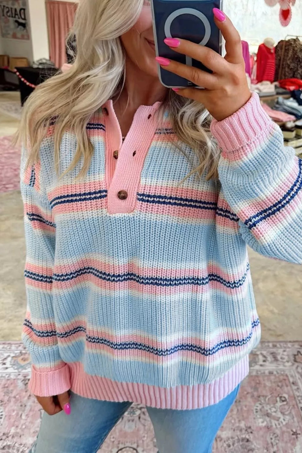 Striped button collar long sleeve knitwear sweater by Trendsi featuring a classic design and comfortable fit.